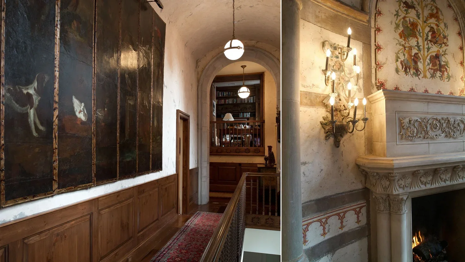 Interior of a historic building with wooden paneling, an arched doorway, artwork on the walls, a fireplace with a carved mantel, and a staircase leading down.