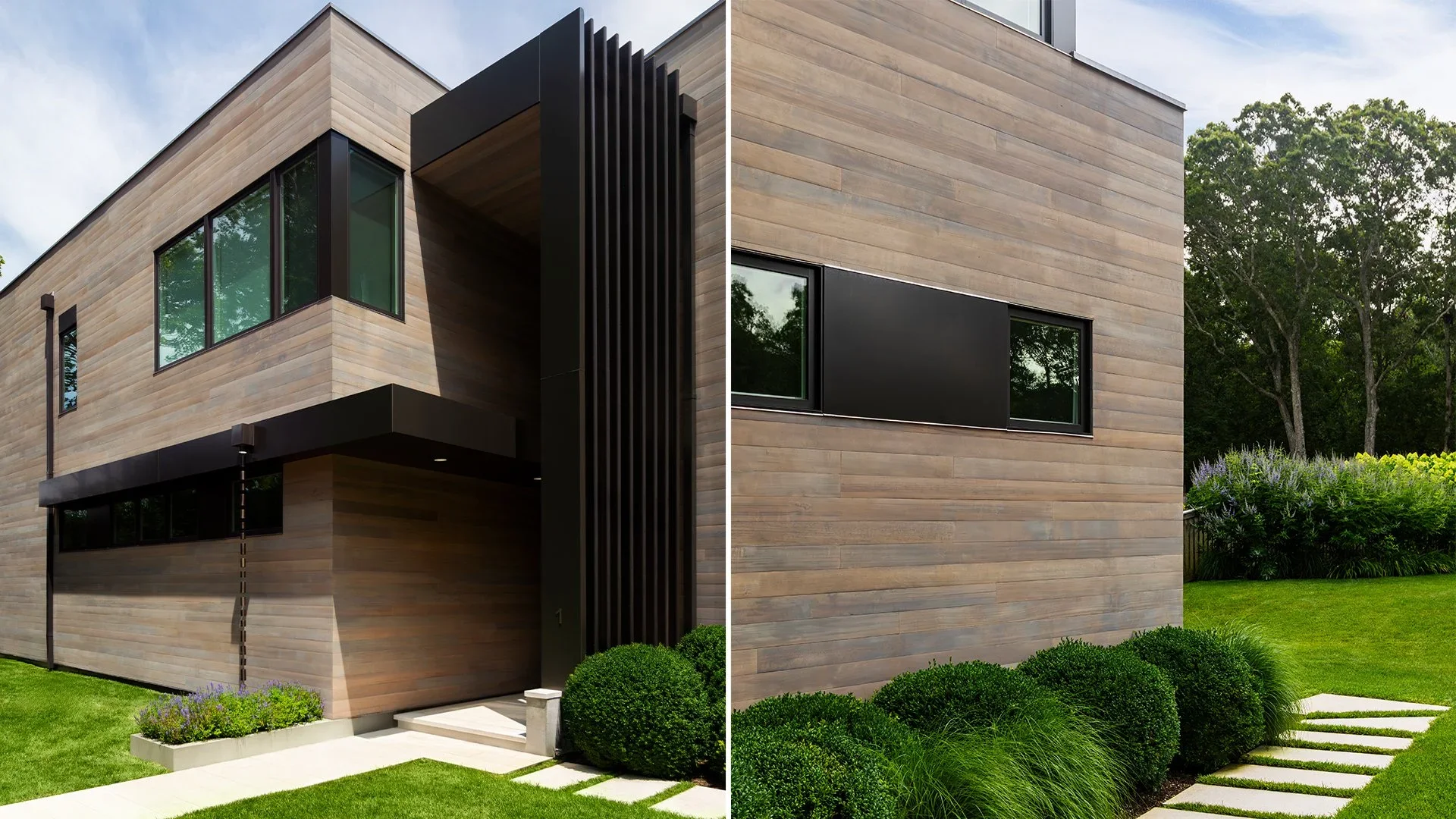 Modern house with wood exterior, large windows, black accents, and landscaped yard with bushes and a stone pathway.