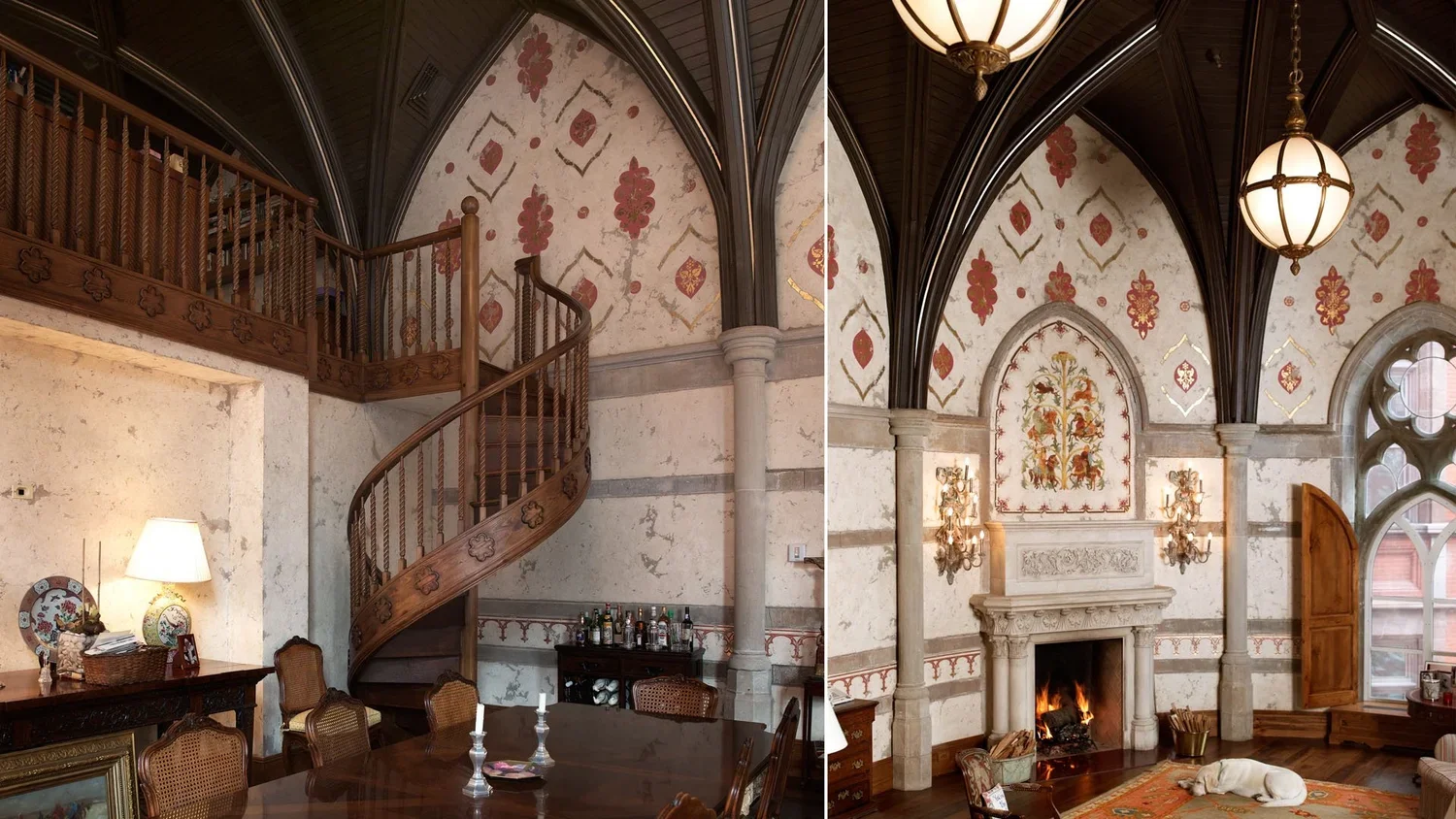 Interior view of an elegant historic room, featuring a sweeping wooden staircase, a decorative painted wall, a fireplace with a painting above, and a dog sleeping on a rug.