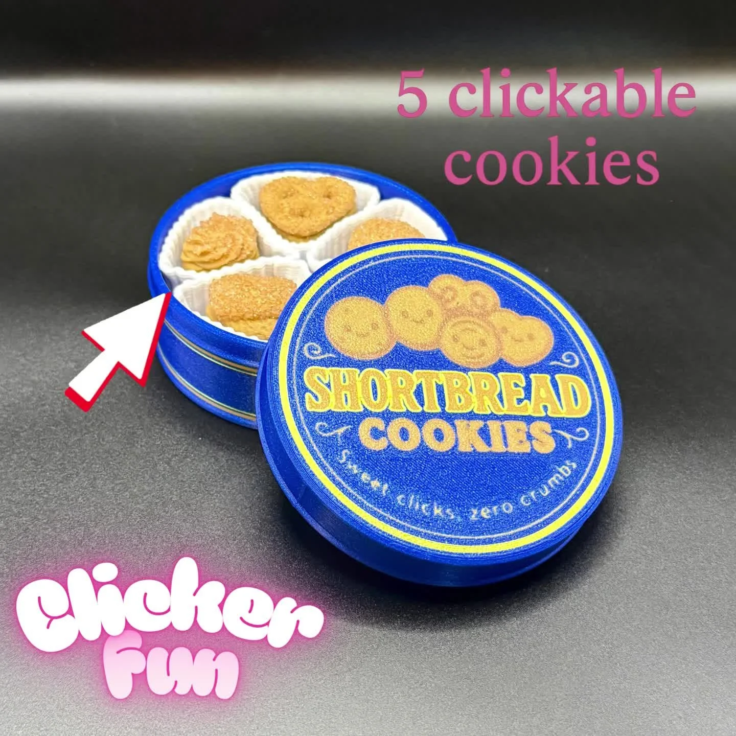 She&rsquo;s not a cookie tin. She&rsquo;s a personality trait. 🍪✨

Shortbread Cookie Tin Clicker = vintage bakery tin on the outside, five tiny stress-relief &ldquo;cookies&rdquo; on the inside. She just sits on your desk looking all cute and innoce