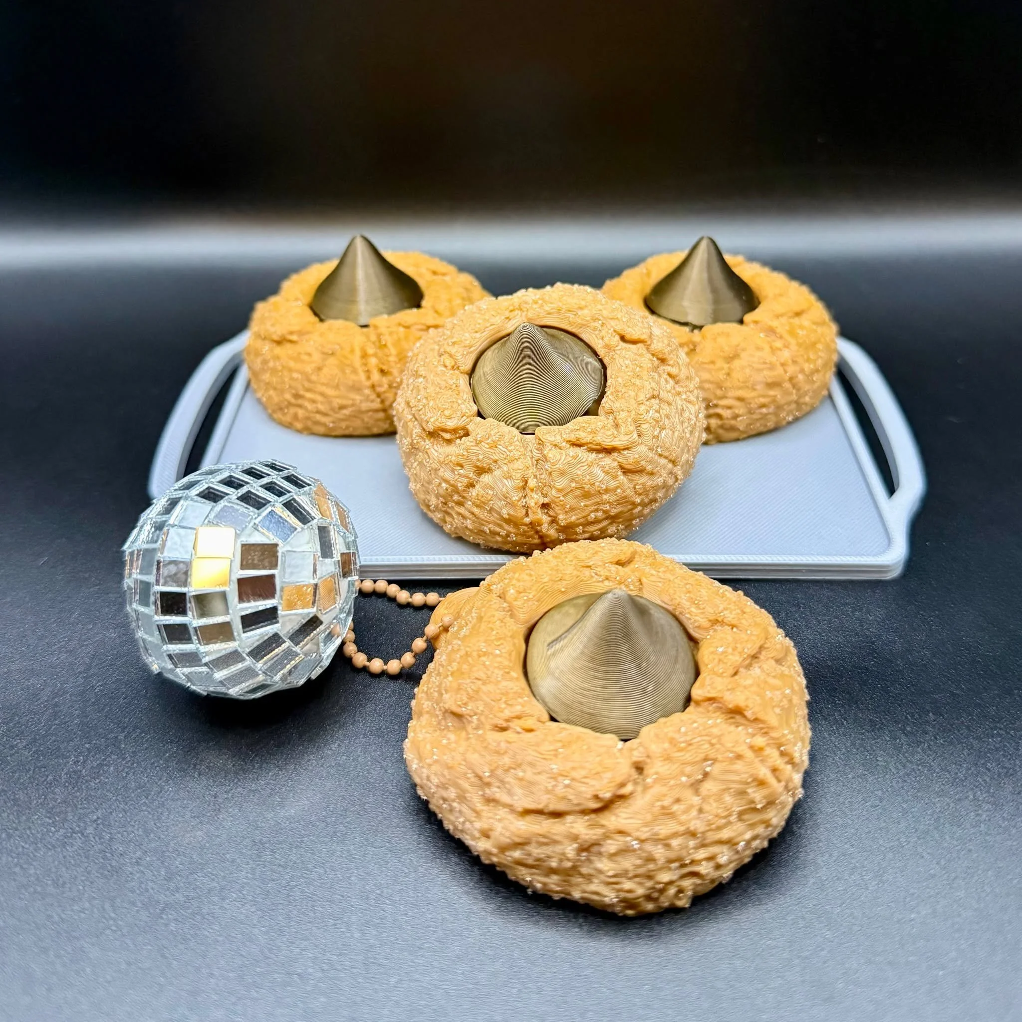 POV: your fidget just crashed the cookie exchange. 🍪✨

Meet the Peanut Butter Blossom Cookie Clicker Keychain &ndash; fake cookie, real serotonin. Textured peanut-butter &ldquo;crumbs,&rdquo; glossy kiss center, and the tiniest click that absolutely