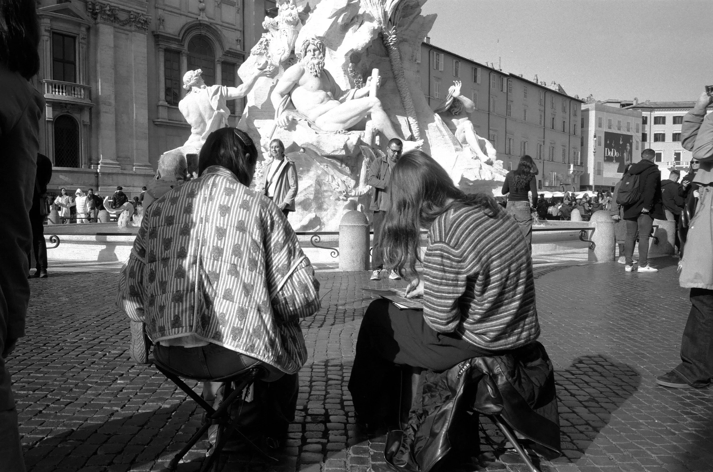 Sketching the Fontana Dei Quattro Fiumi, Piazza Navona, Rome. Ilford FP4.