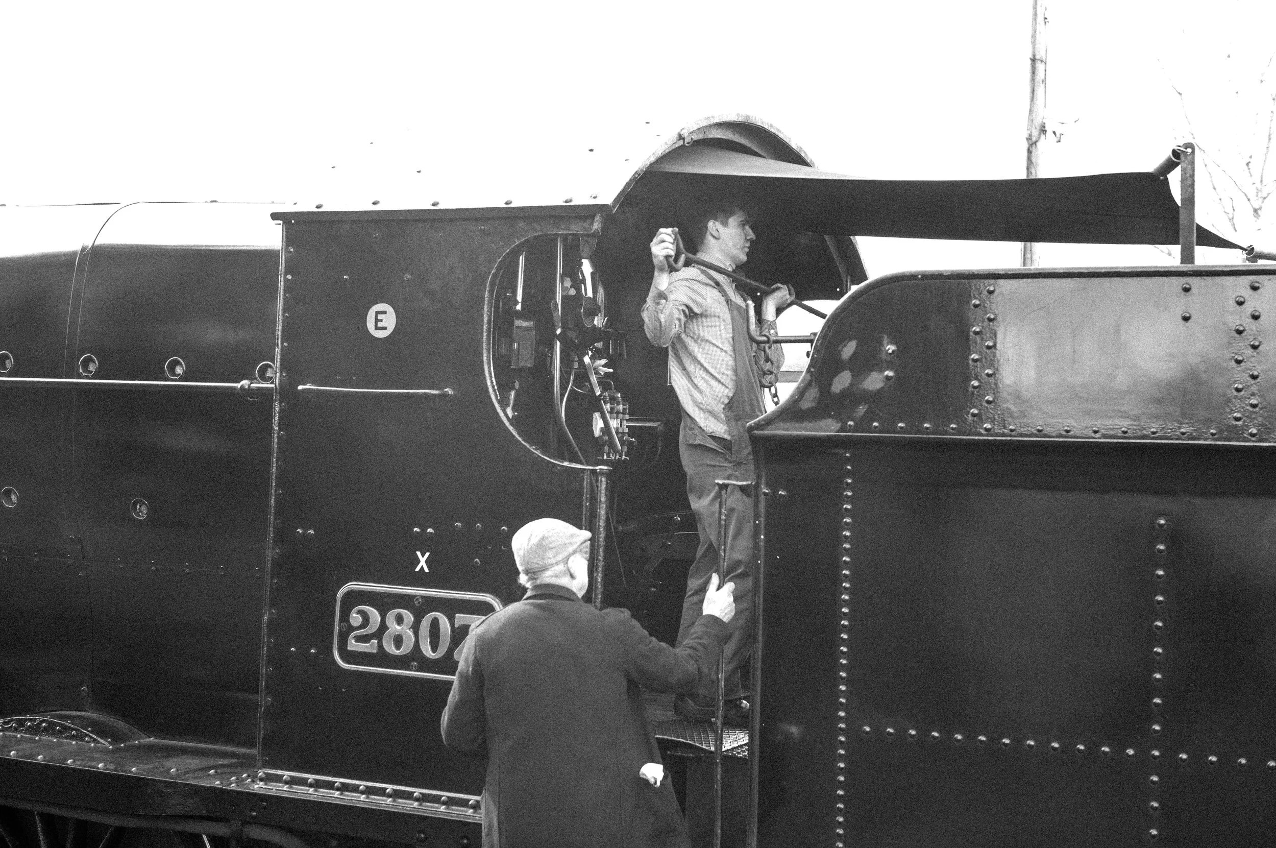 The driver and fireman at the end of their day. 