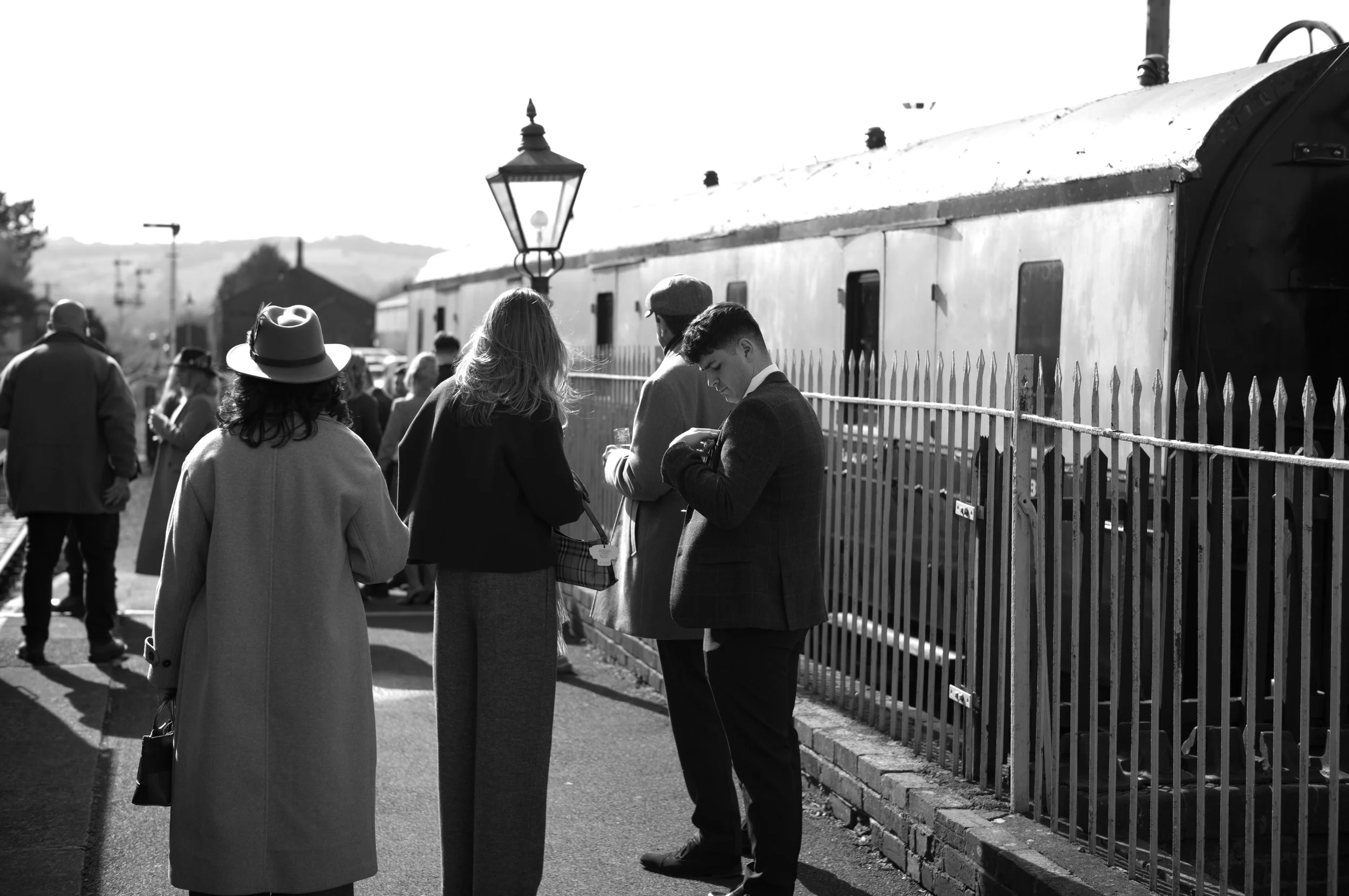 Race goers waiting to board.