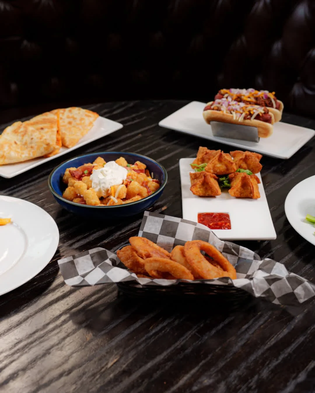 Every play's a winner when the table looks like this &mdash; tots, dogs, and apps for days.

#EatDrinkPlay #ColumbiaEats #GameTimeTogether #TheYardCola