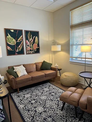 A licensed therapist's office filled with comfortable furniture and warm sunlight at Stafford and Associates Counseling in Mooresville, NC