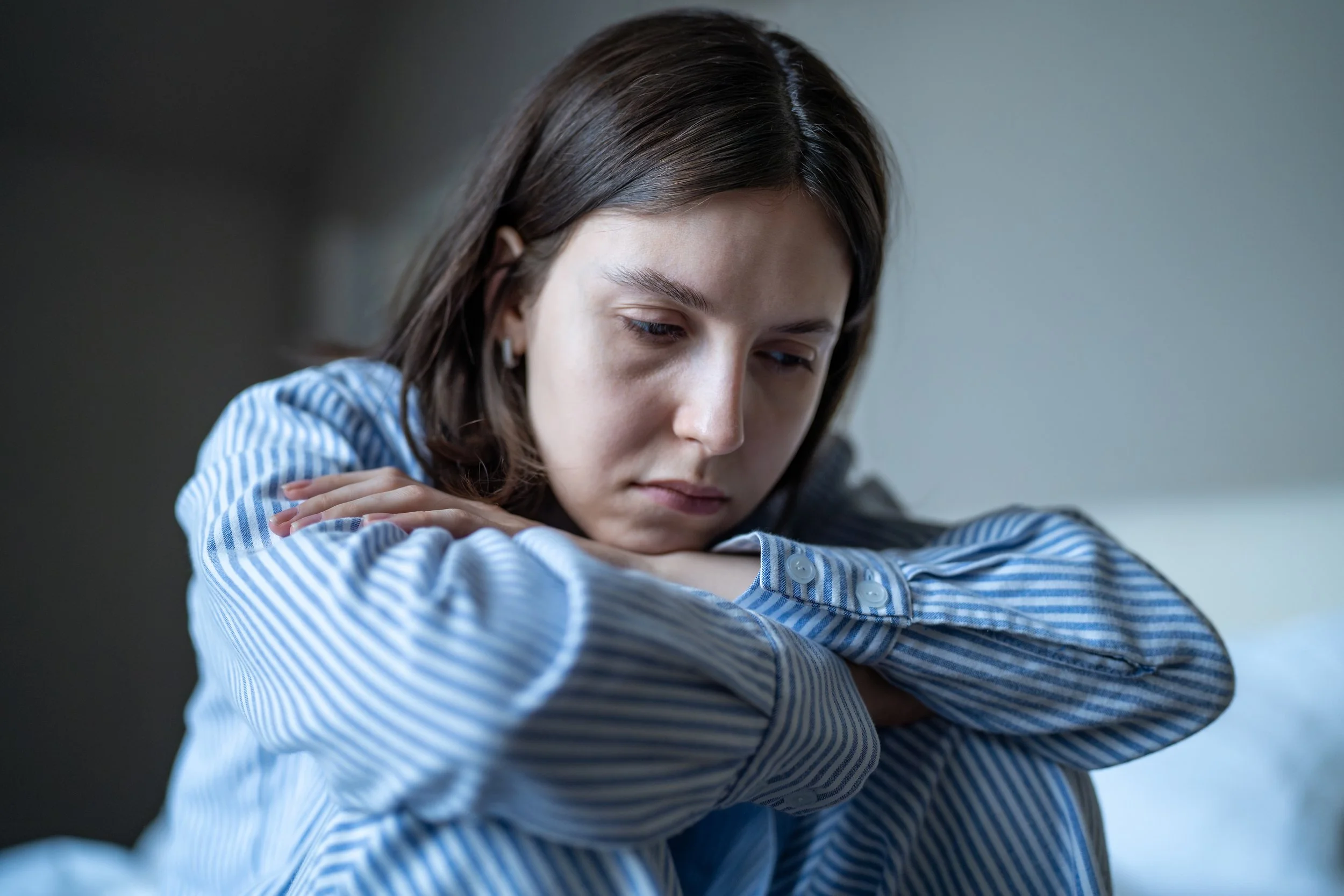 A young woman considering therapy for personality disorders at Stafford and Associates Counseling