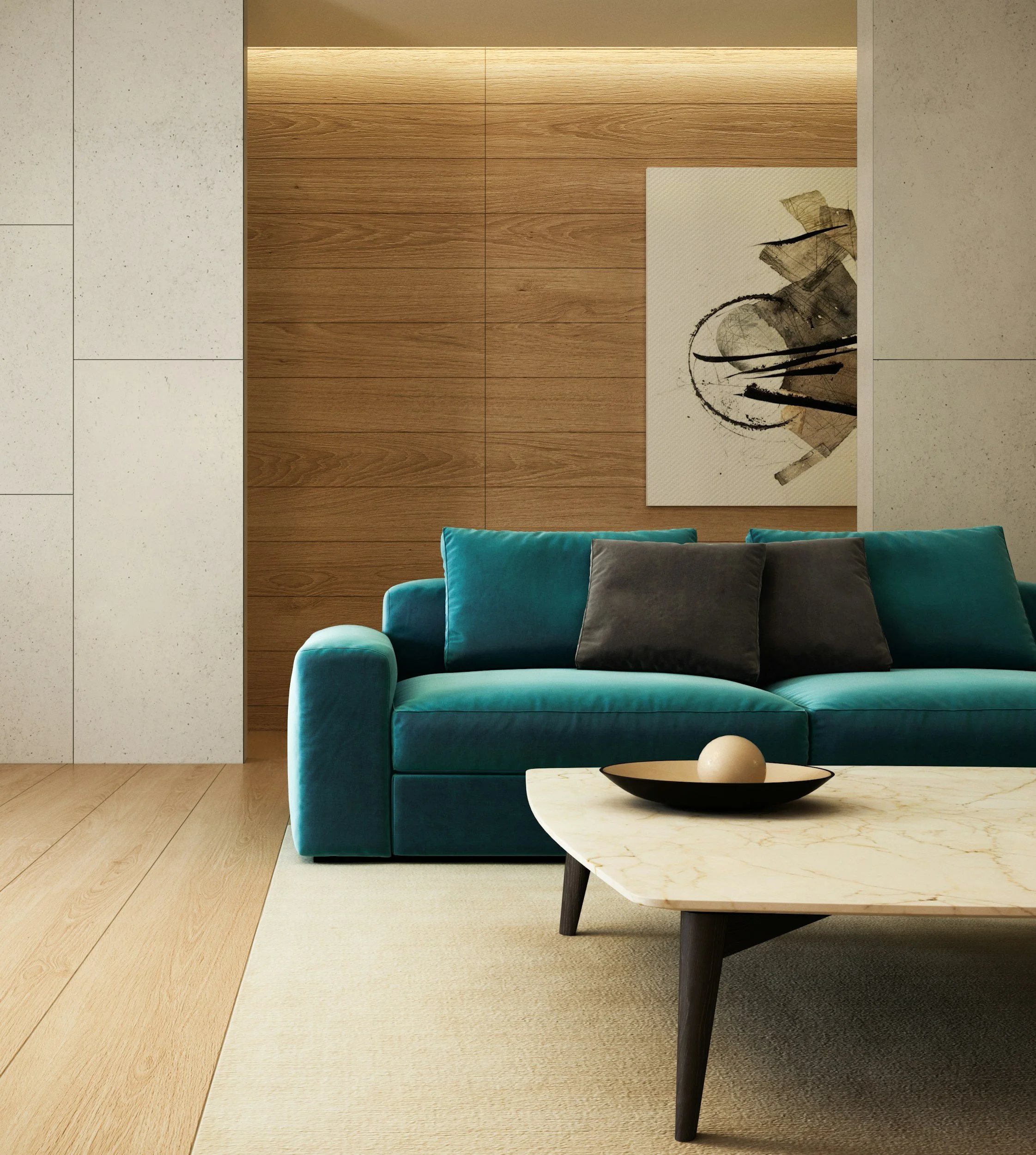 Modern living room with a turquoise velvet sofa, black and gray pillows, abstract artwork on wood-paneled wall, marble coffee table with a black dish and a white decorative sphere, beige area rug, and wood flooring.