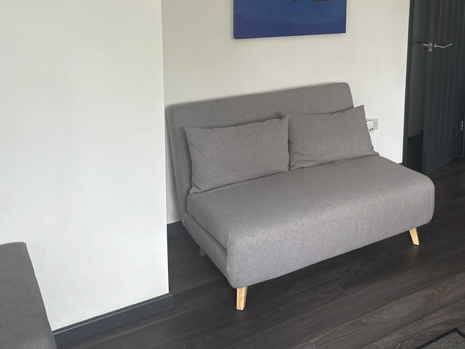 Sofa-bed re-upholstered