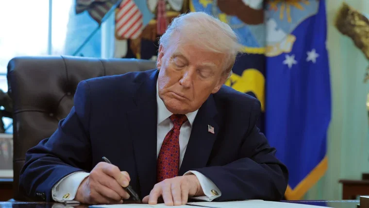 Trump signs executive order fast-tracking reclassification of marijuana