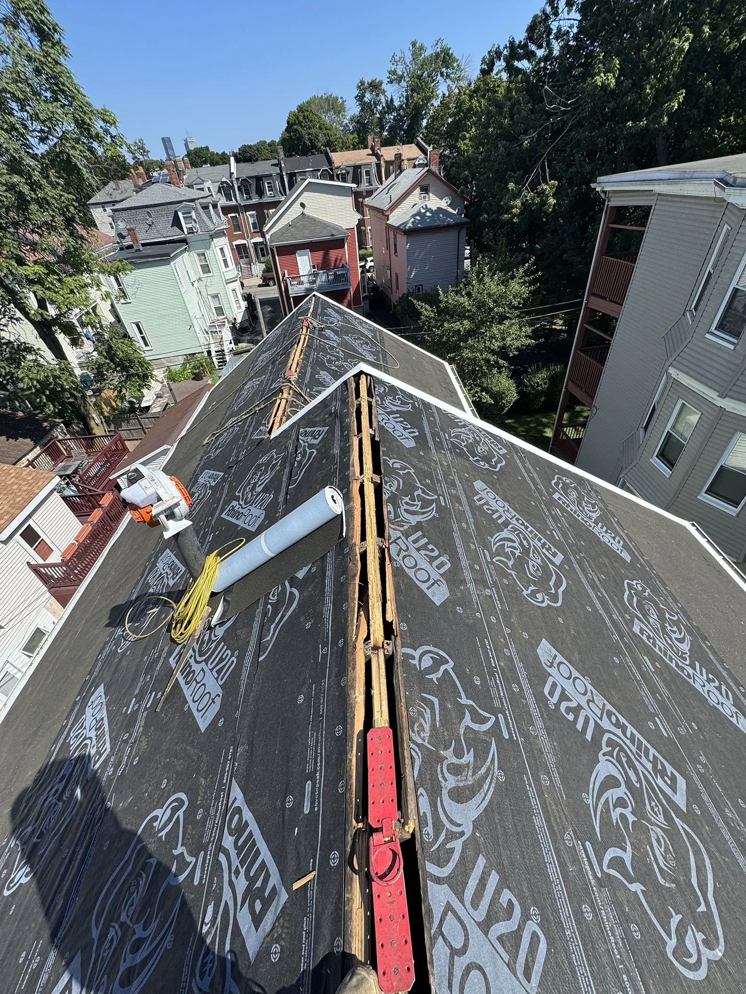 Before-and-after comparison of a completed roof project