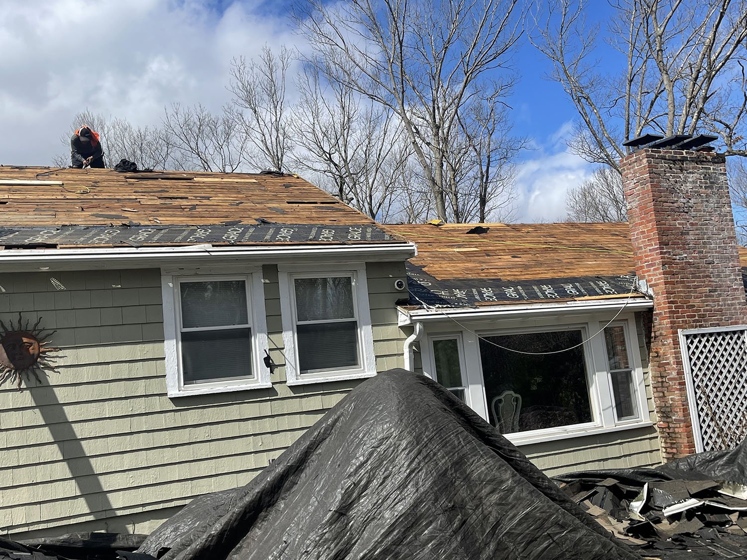Before-and-after comparison of a completed roof project
