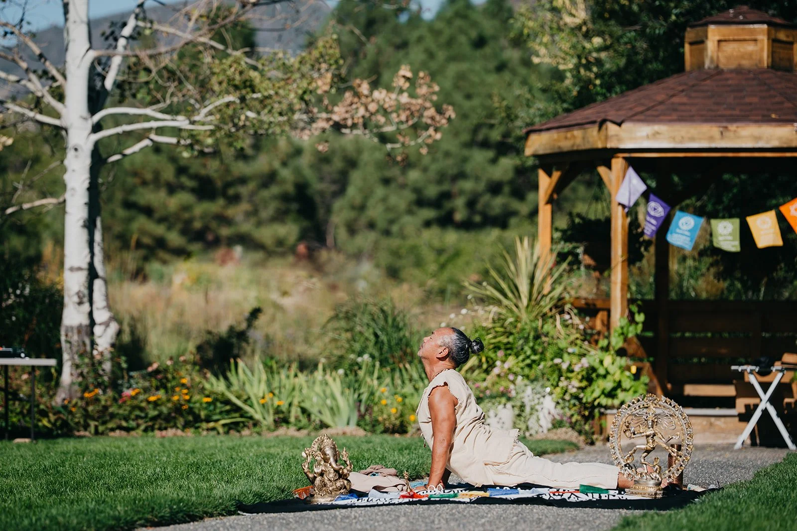 Dasa Das in updog at Open Air Chapel Chatfield Botanic Gardens Colorado Yoga Festival