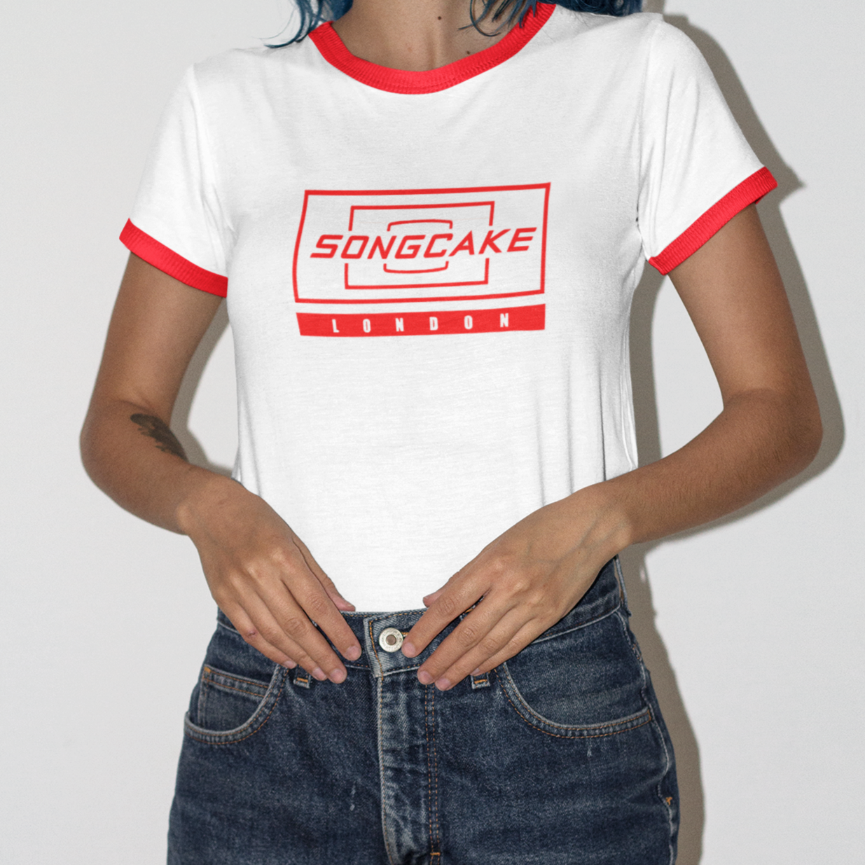 copy-of-cropped-face-girl-wearing-a-ringer-t-shirt-mockup-against-a-white-wall-a16990.png