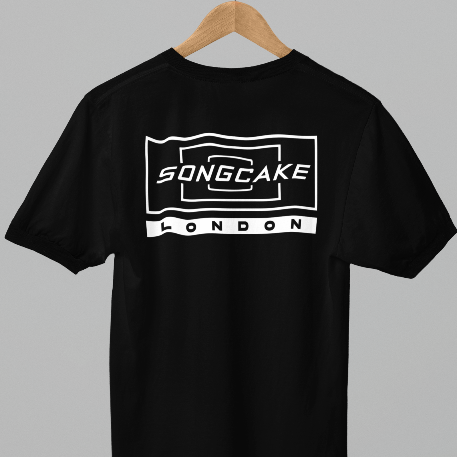 copy-of-copy-of-ringer-t-shirt-back-mockup-hanging-on-a-wooden-hanger-against-a-solid-color-background-m50292-5.png