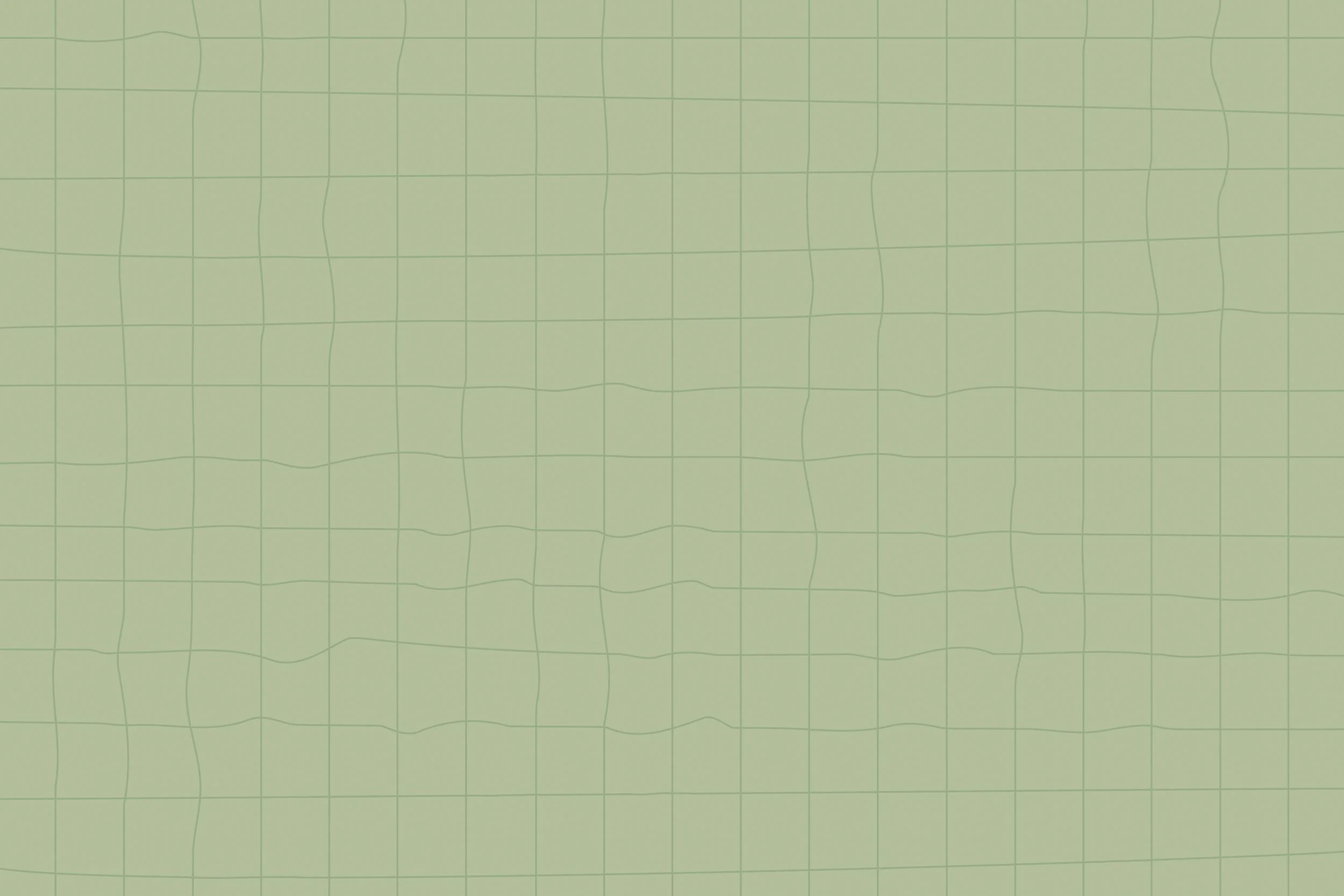 Close-up of a green grid pattern on a textured surface.