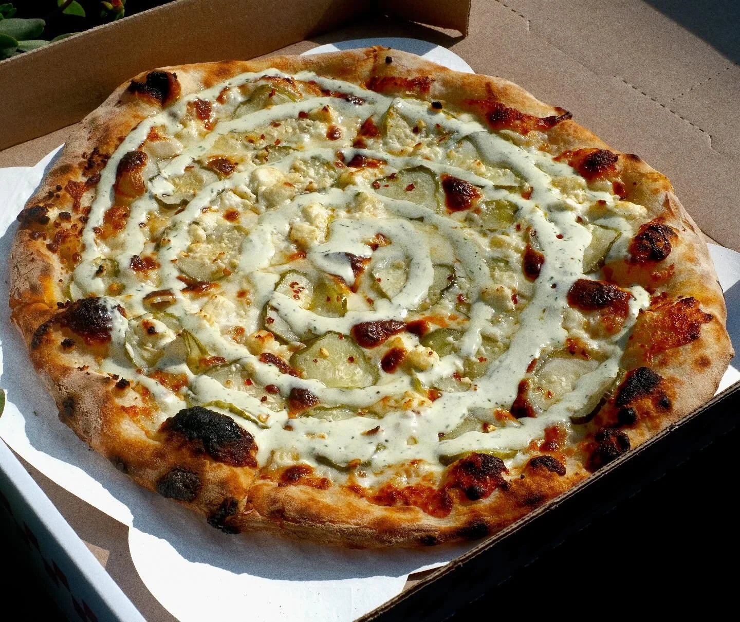 Tangy pickles, melty cheese, &amp; a drizzle of cilantro feta ranch&hellip; now that&rsquo;s a plot twist worth tasting.

#PicklePizza #InstaPizza #ColumbusEats #PizzaLove #FoodieColumbus #EatLocal #ColumbusFoodies
