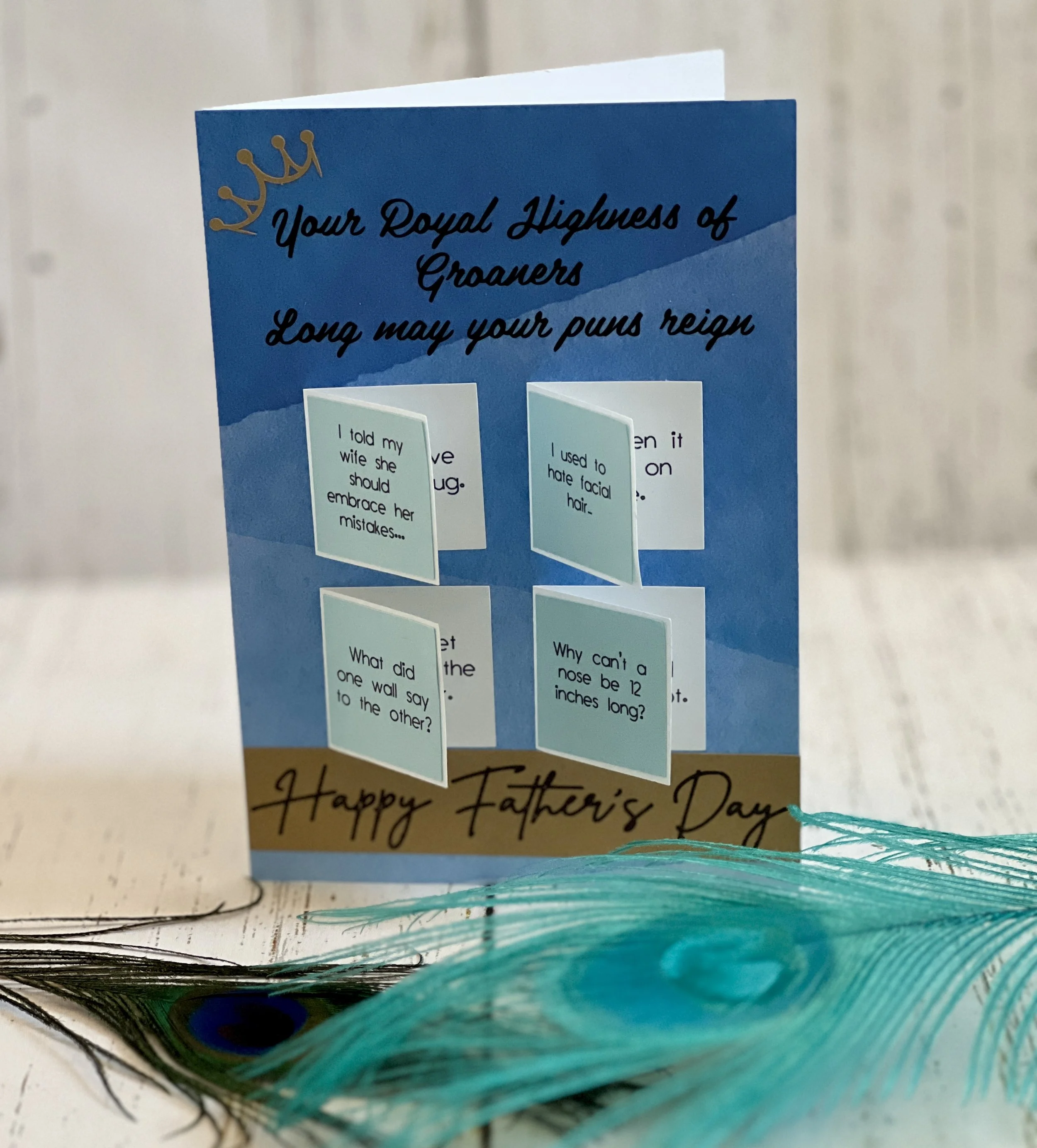 Father's Day greeting card with humorous messages and peacock feathers.