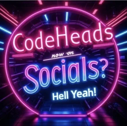 Neon sign reading 'CodeHeads now on Socials? Hell Yeah!' surrounded by bright pink and blue neon lights