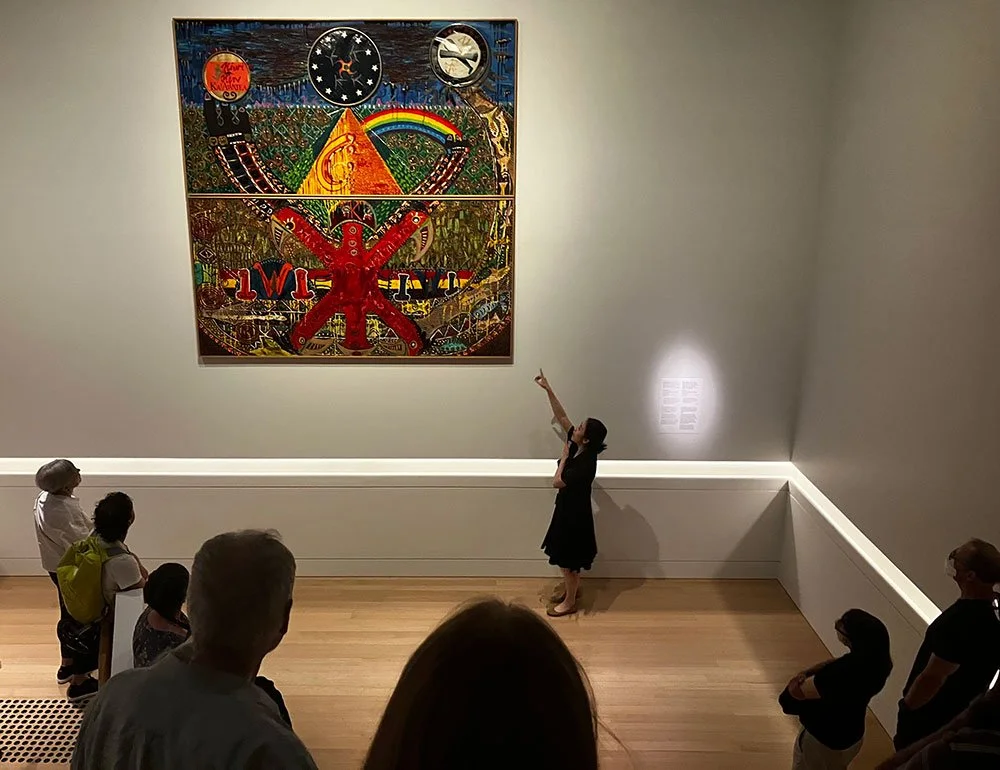 Painting Conservator Hae Min Park points out her restoration treatment