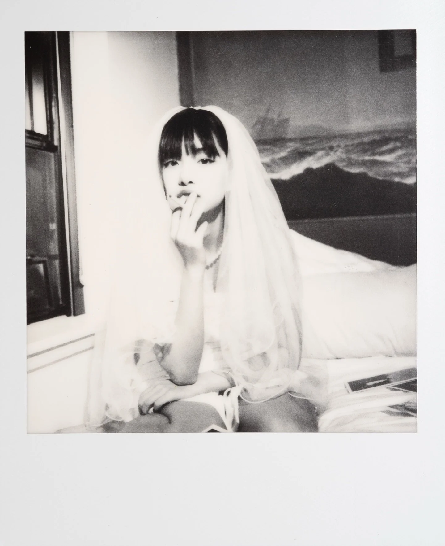 Love, held in white borders.