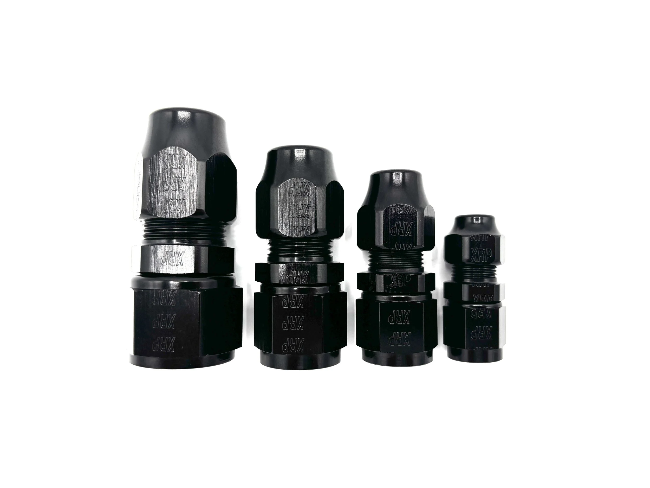 XRP AN female to tube compression adapter fitting. Black in color. Various sizes from largest to smallest, left to right.