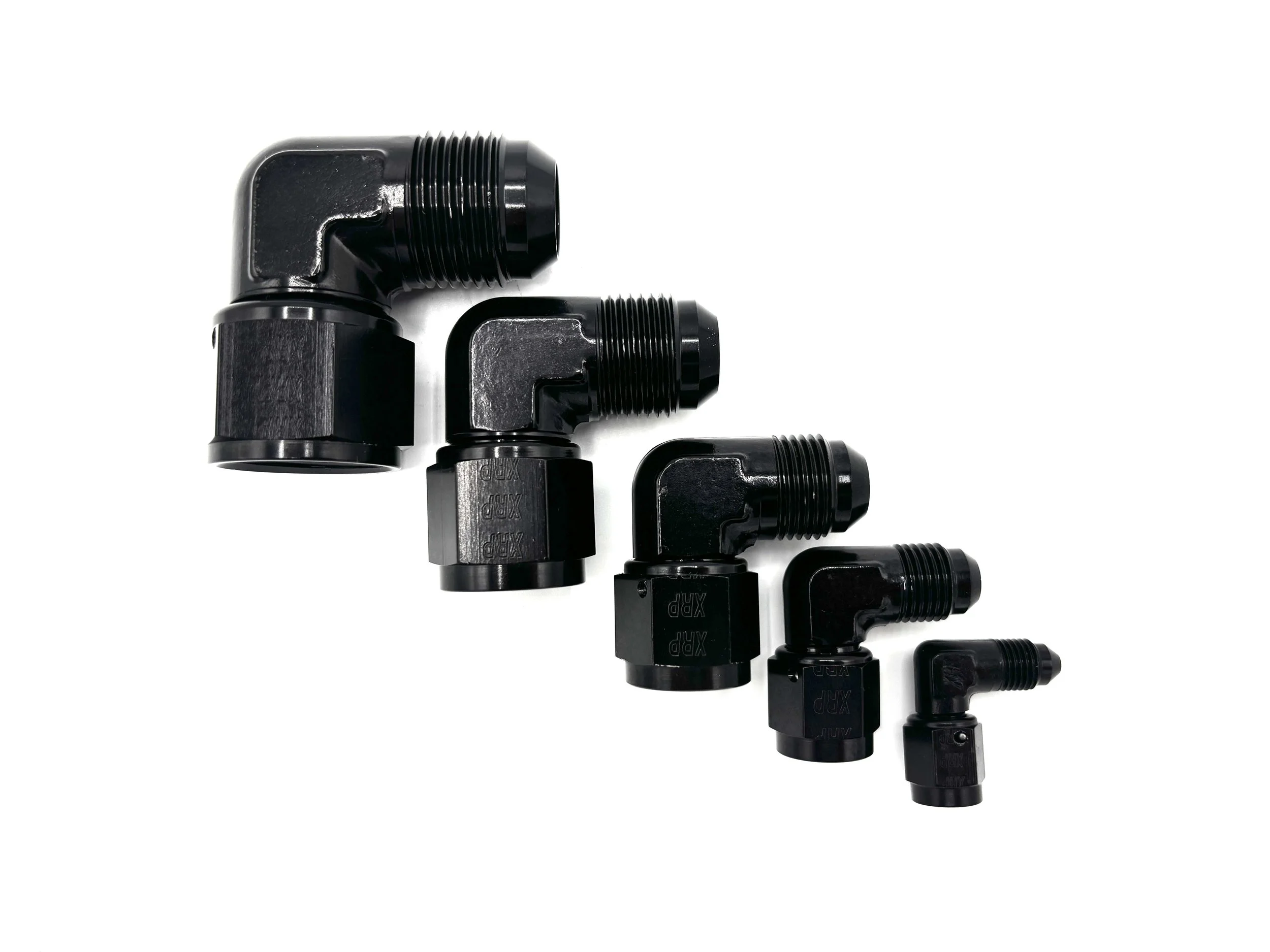 Five 90 Deg. Forged AN Female Swivel To AN Male Adapter fittings black. The bends are going towards the right. They are arranged in a line from largest to smallest.