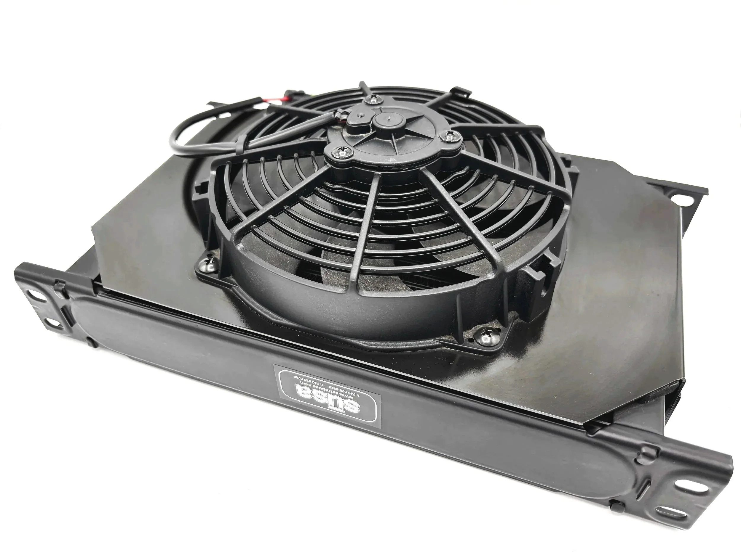 Side view Large Black Oil cooler with fins in the middle and a large fan with a shroud