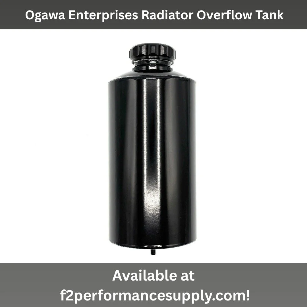 Ogawa Enterprises radiator overflow tank. It is a rear mounted tank tapped to 1/4-20 thread, mounting holes measure 2&rdquo; center to center. Has a capacity of 1-1/2 quart. Measures 4&rdquo; diameter and 9-1/2&rdquo; tall including cap. Features a 1