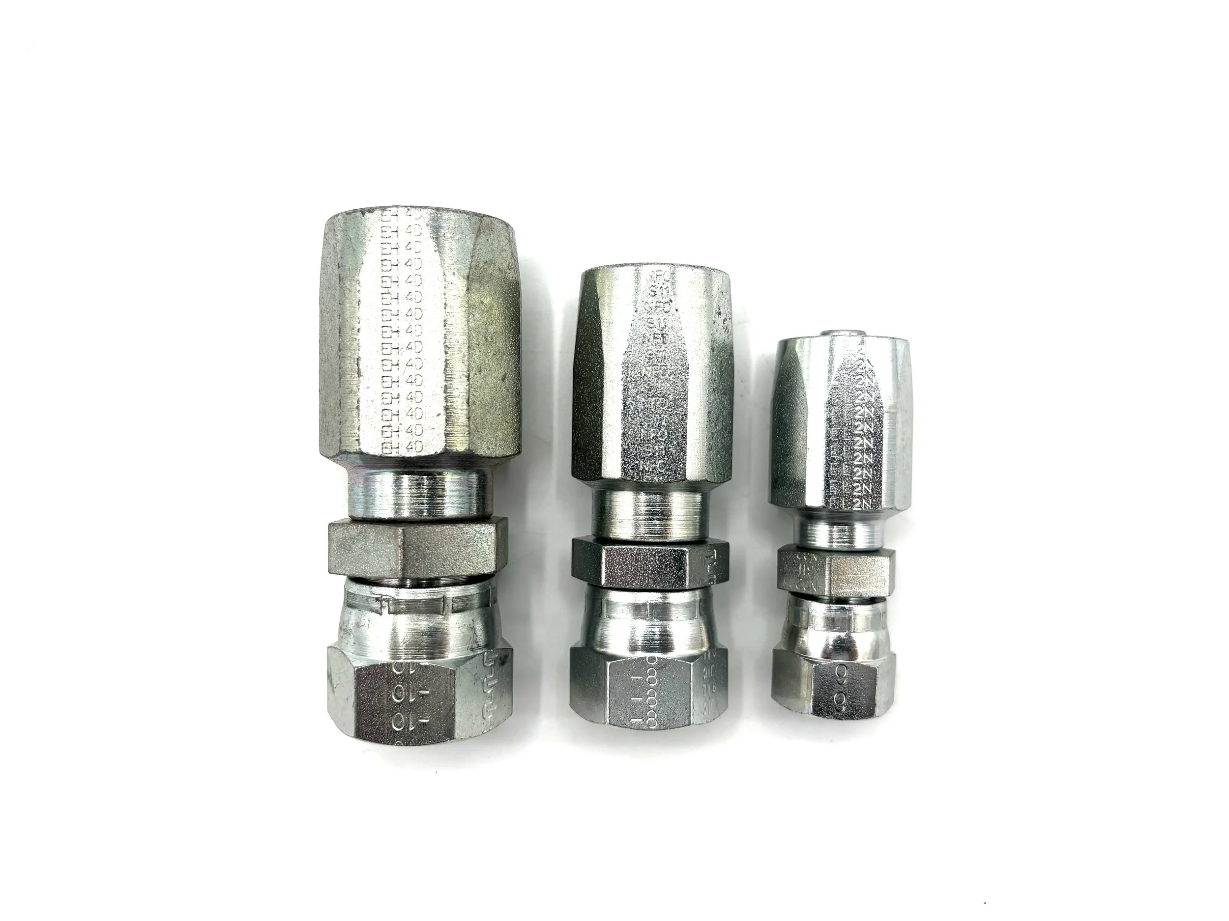 Straight Power Steering Hose End to AN Female. Straight fitting, silver in color. Side View. Multiple in a line from largest size to smallest size.