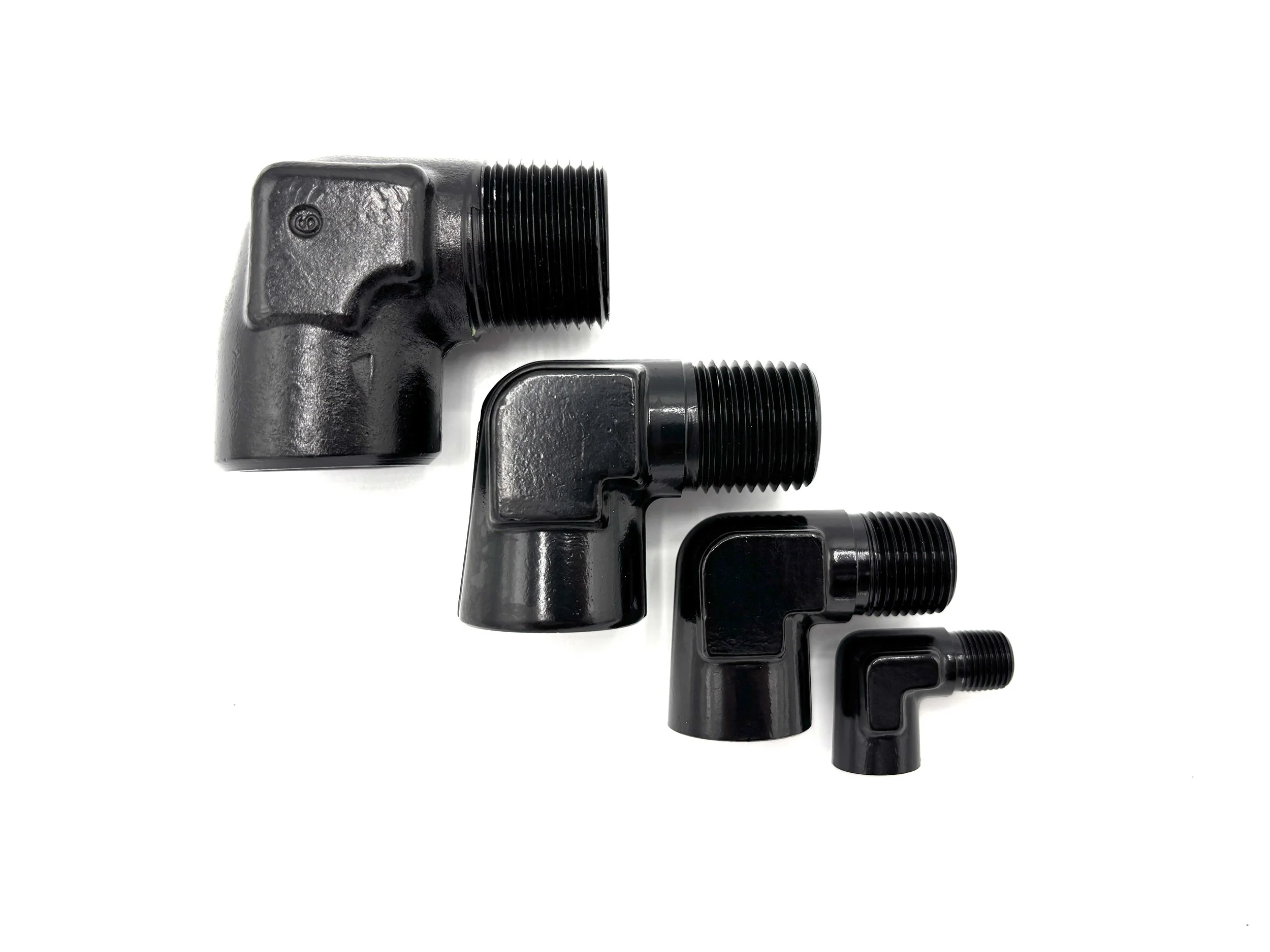 XRP 90 deg. NPT male to female adapter fitting. Black in color. Various sizes from largest to smallest, left to right.