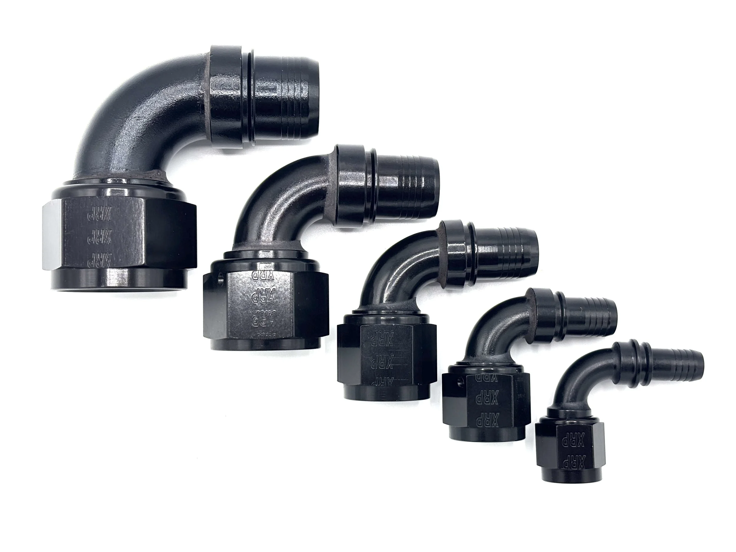 XRP 90 deg. race crimp hose end to AN female. Black in color. Various sizes from largest to smallest, left to right.