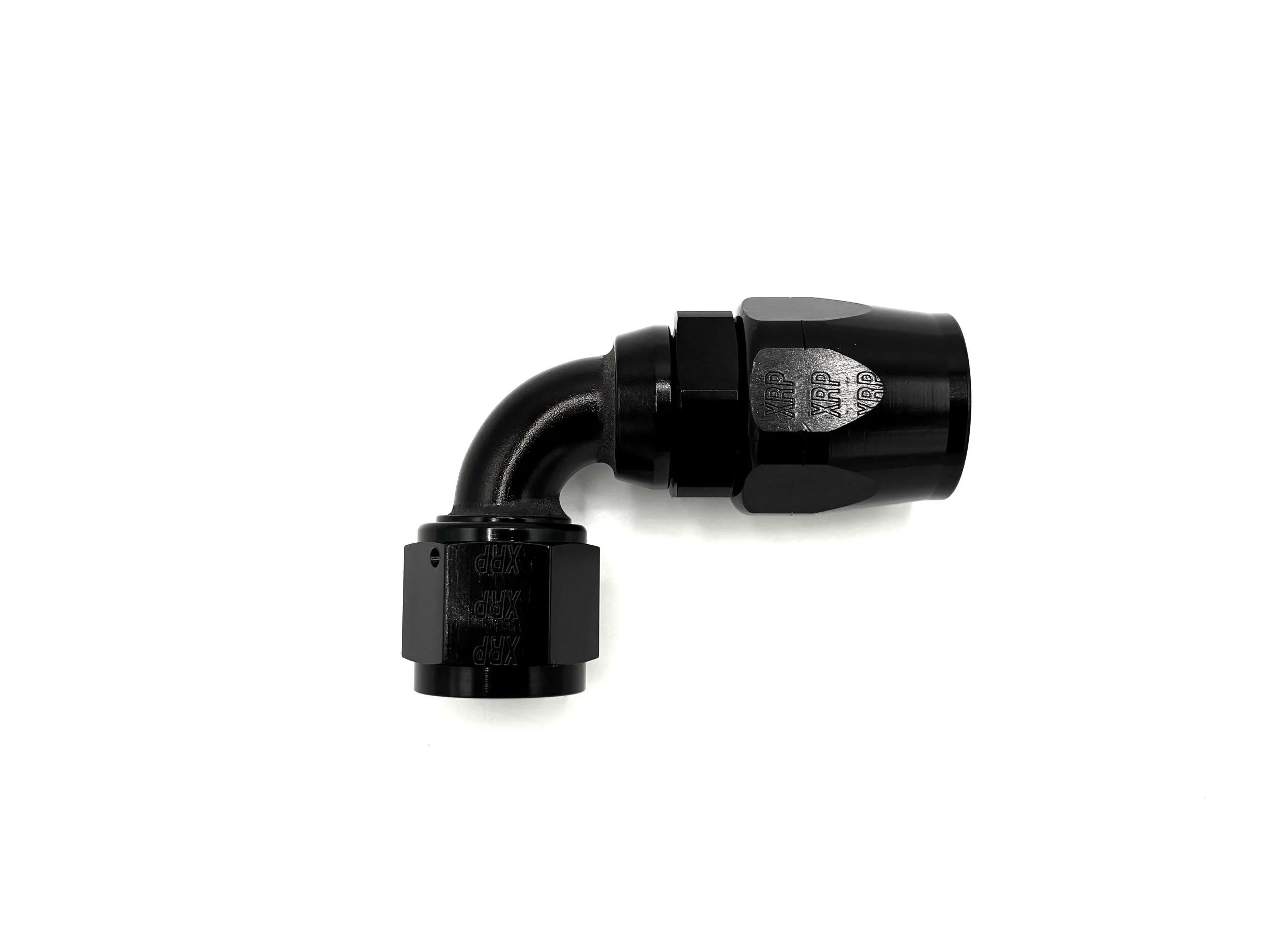 90 Deg. Swivel -12AN Hose End to -10AN Female Adapter fitting black. The bend is going towards the right.