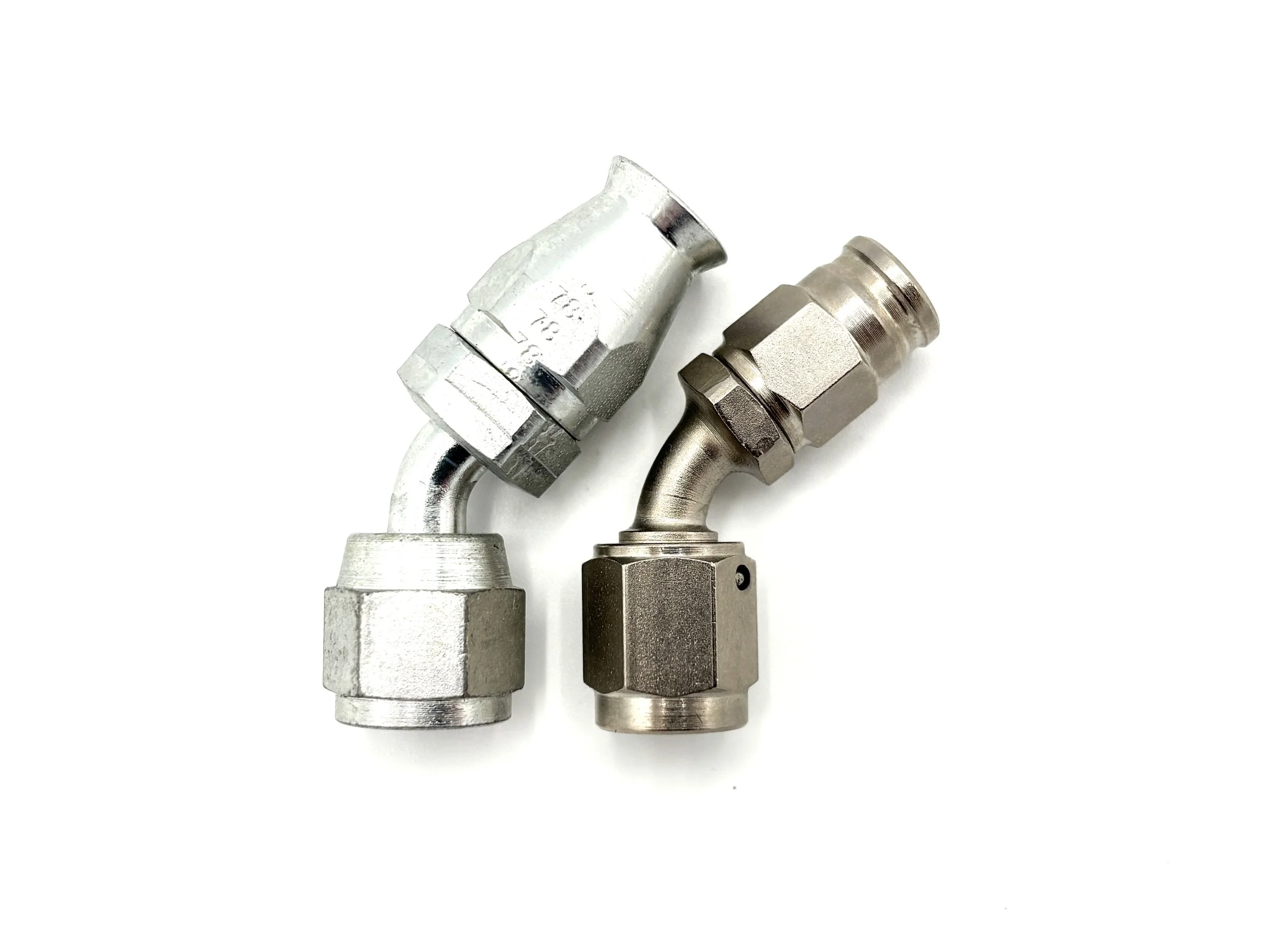 XRP 45 deg. AN PTFE steel hose end to AN female. Silver in color. Various sizes from largest to smallest, left to right.