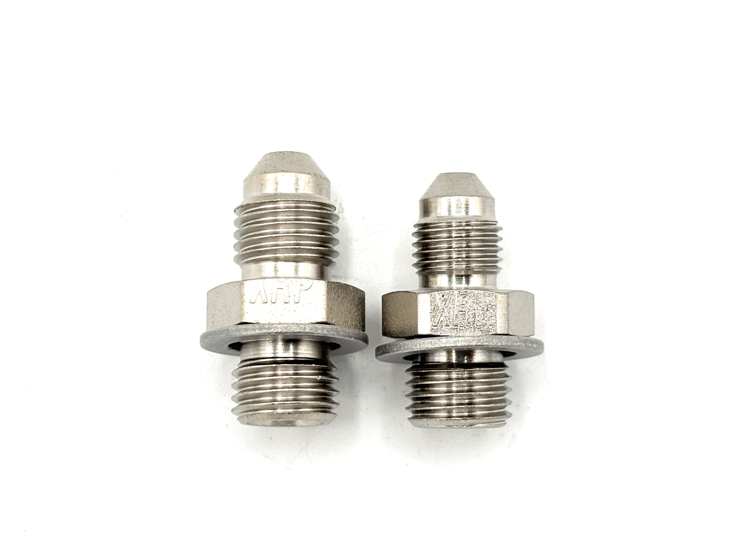 XRP AN male to 7/16-20 male steel crush washer seal adapter. Silver in color. Various sizes from largest to smallest, left to right.