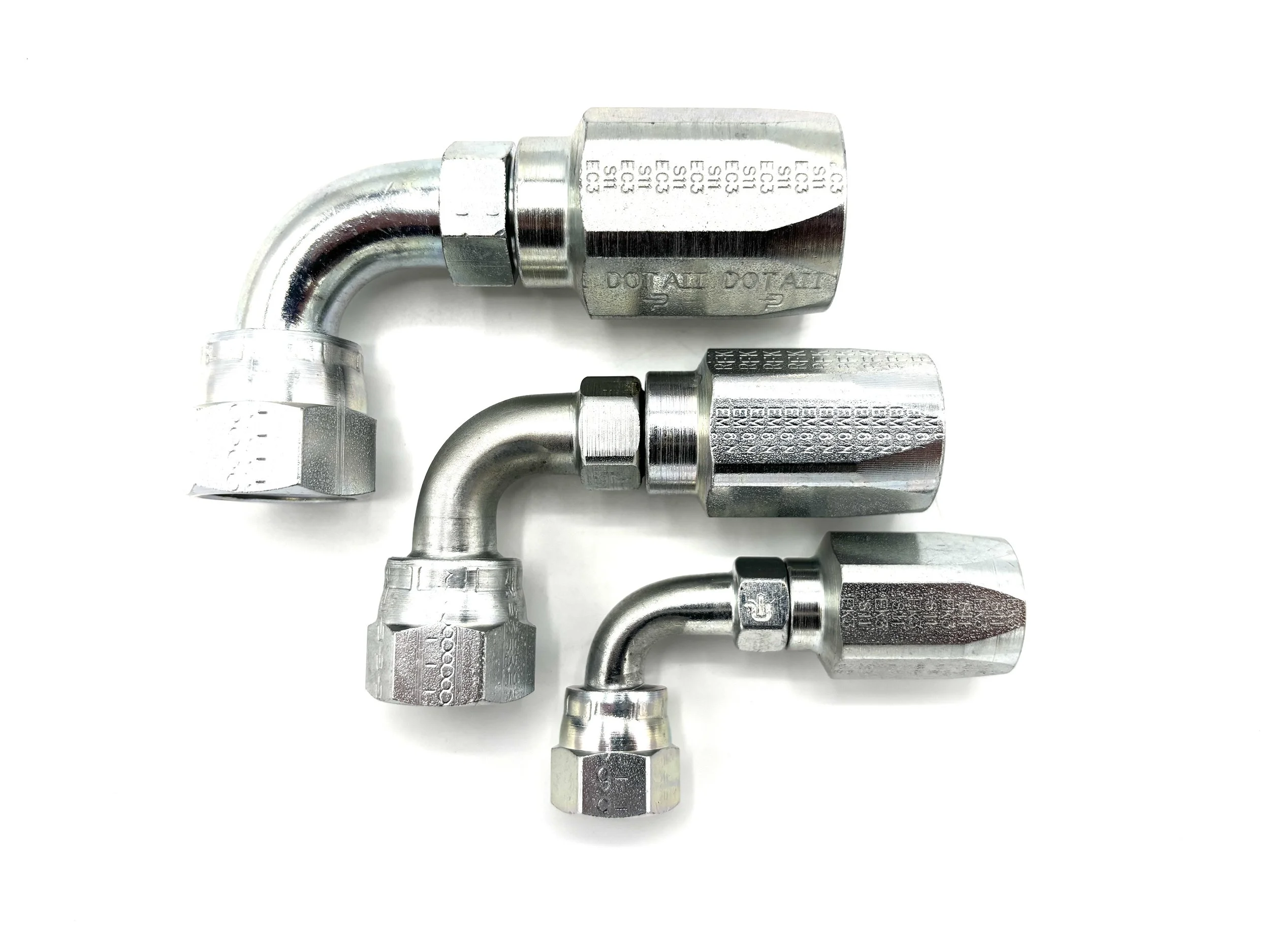 90 Deg. Power Steering Hose End to AN Female. 90 degree fitting, silver in color. Side View. Multiple are arranged from largest size to smallest size.