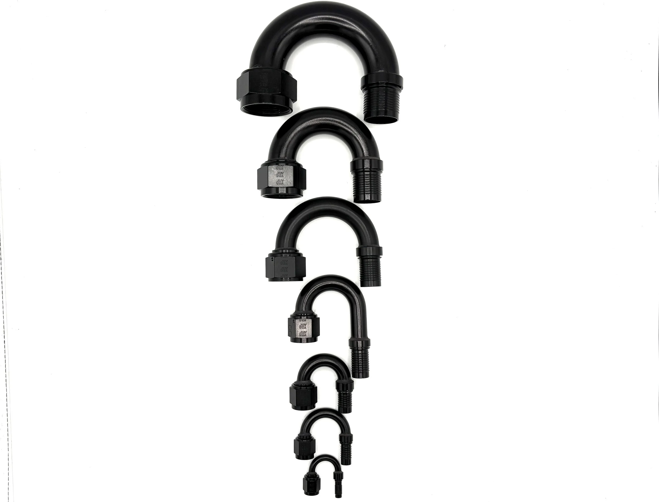 XRP 180 deg. HS-79 crimp hose end to AN female. Black in color. Various sizes from largest to smallest, left to right.