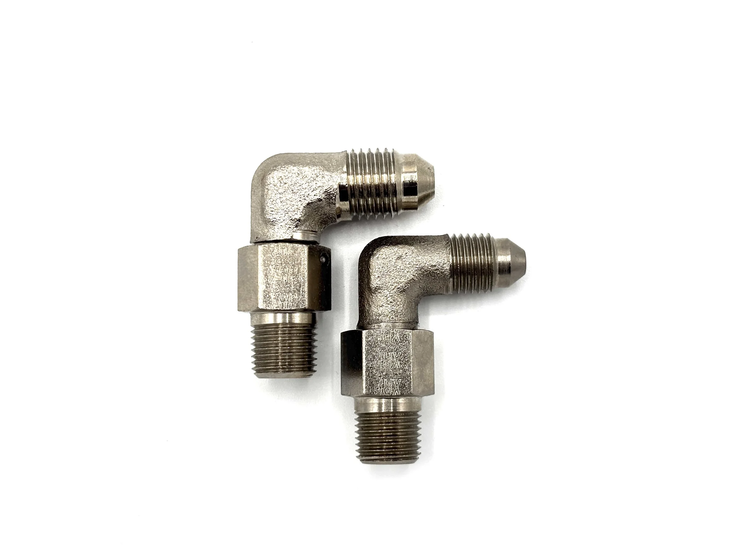 90 Deg. Forged AN Male to 1/8NPT Steel Adapter. Silver in color. Two fittings in a line, largest to smallest, left to right.