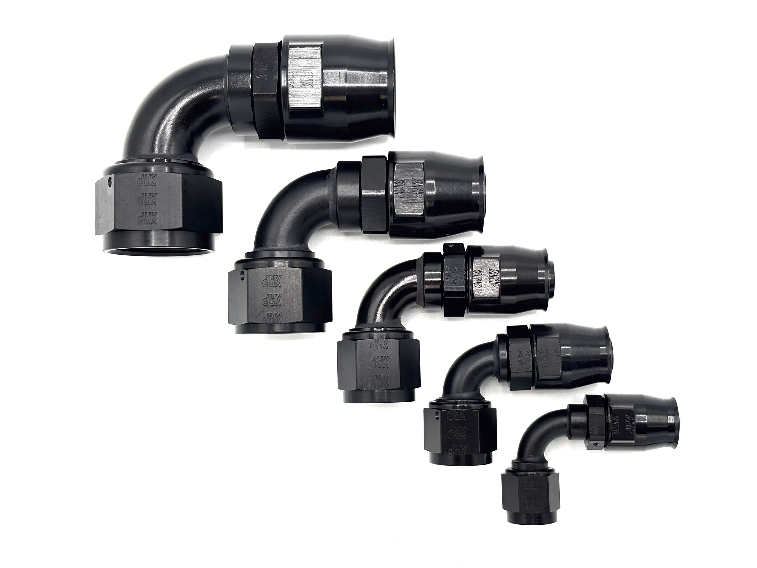 XRP 90 deg. swivel Race Reusable hose end to AN female. Black in color. Various sizes from largest to smallest, left to right.