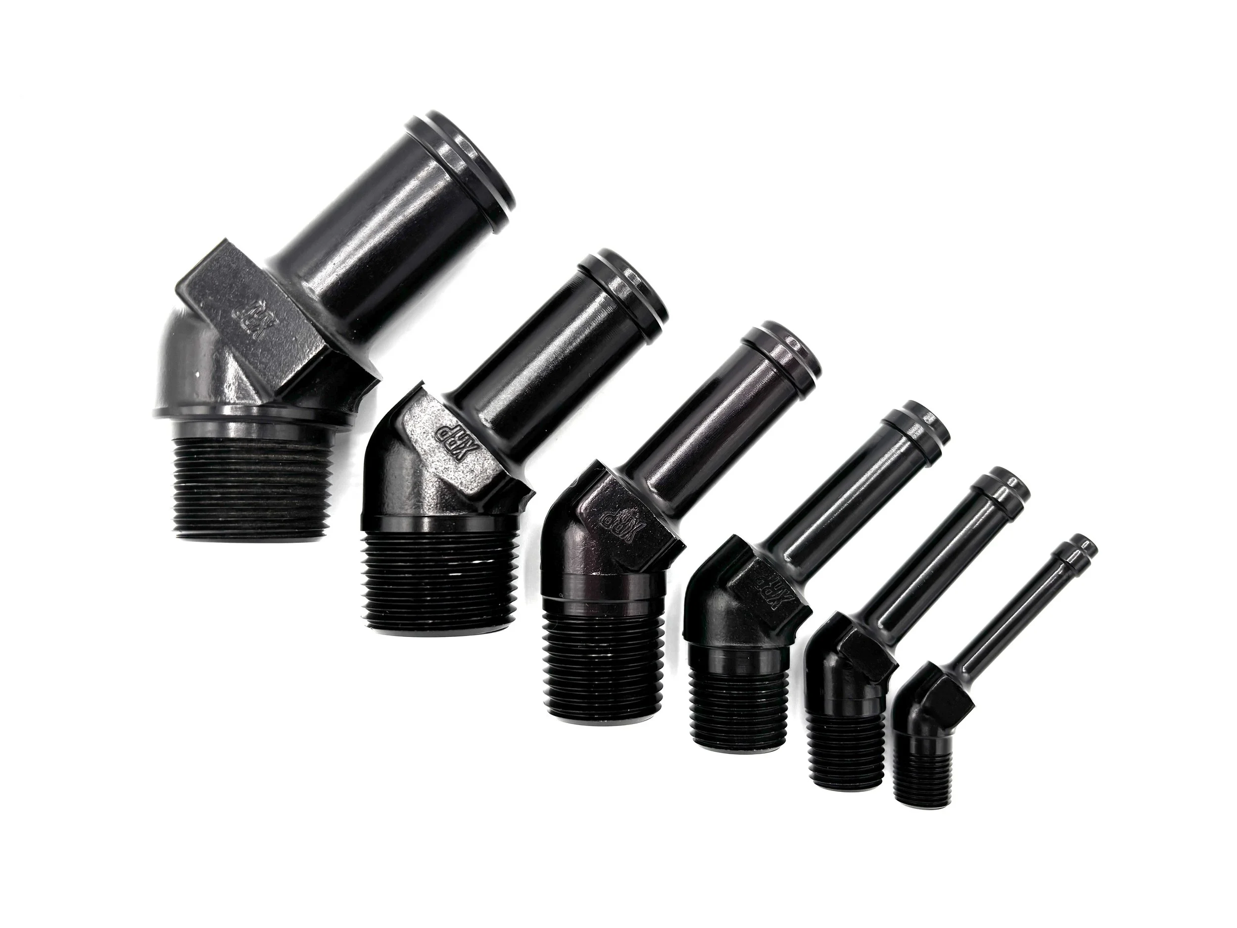 XRP 45 deg. hose barb to NPT adapter fitting. Black in color. Various sizes from largest to smallest, left to right.