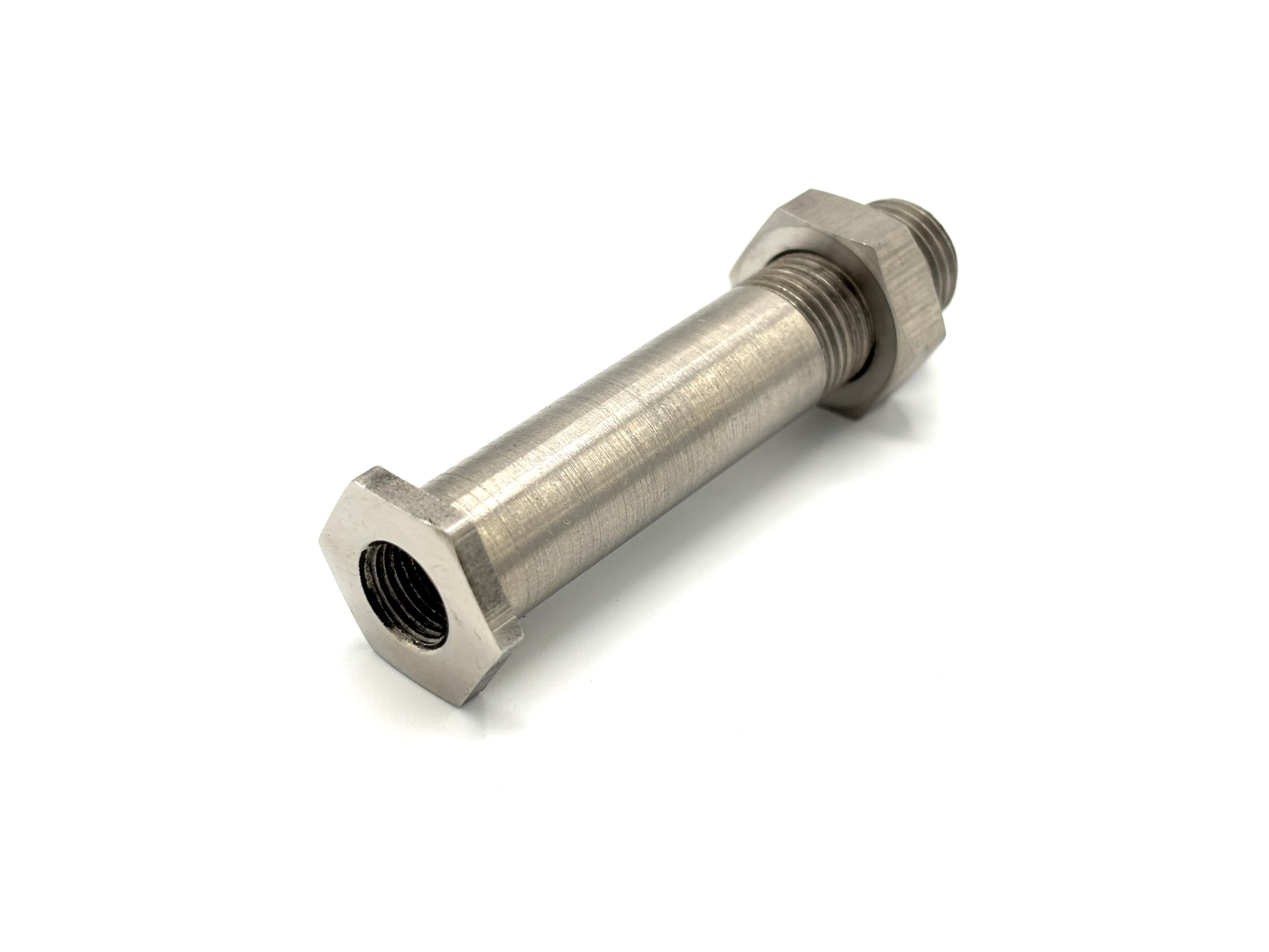 1/8NPT thru frame adapter fitting. Silver in color.