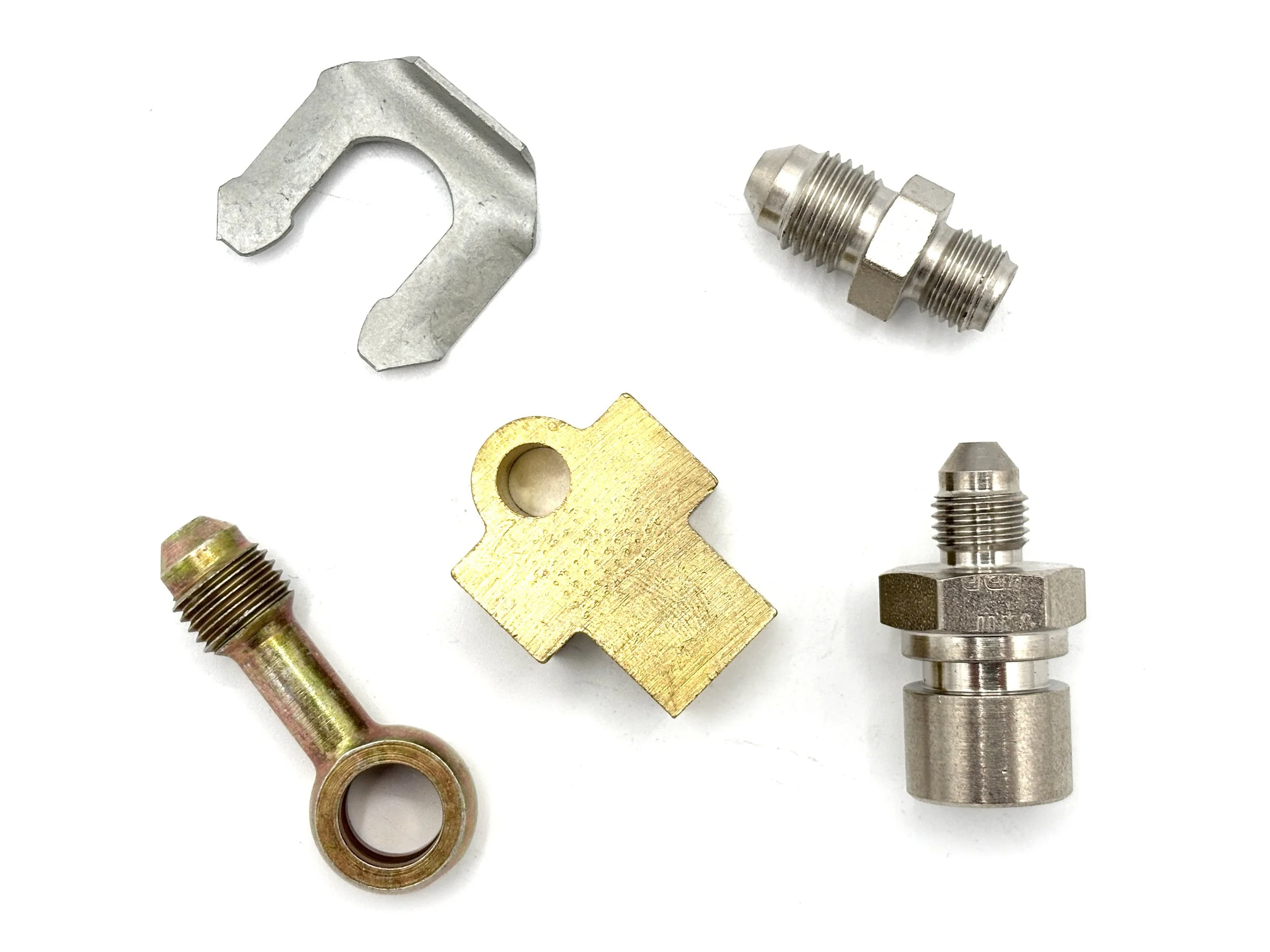 Collection of brake adapter fittings on a white background.