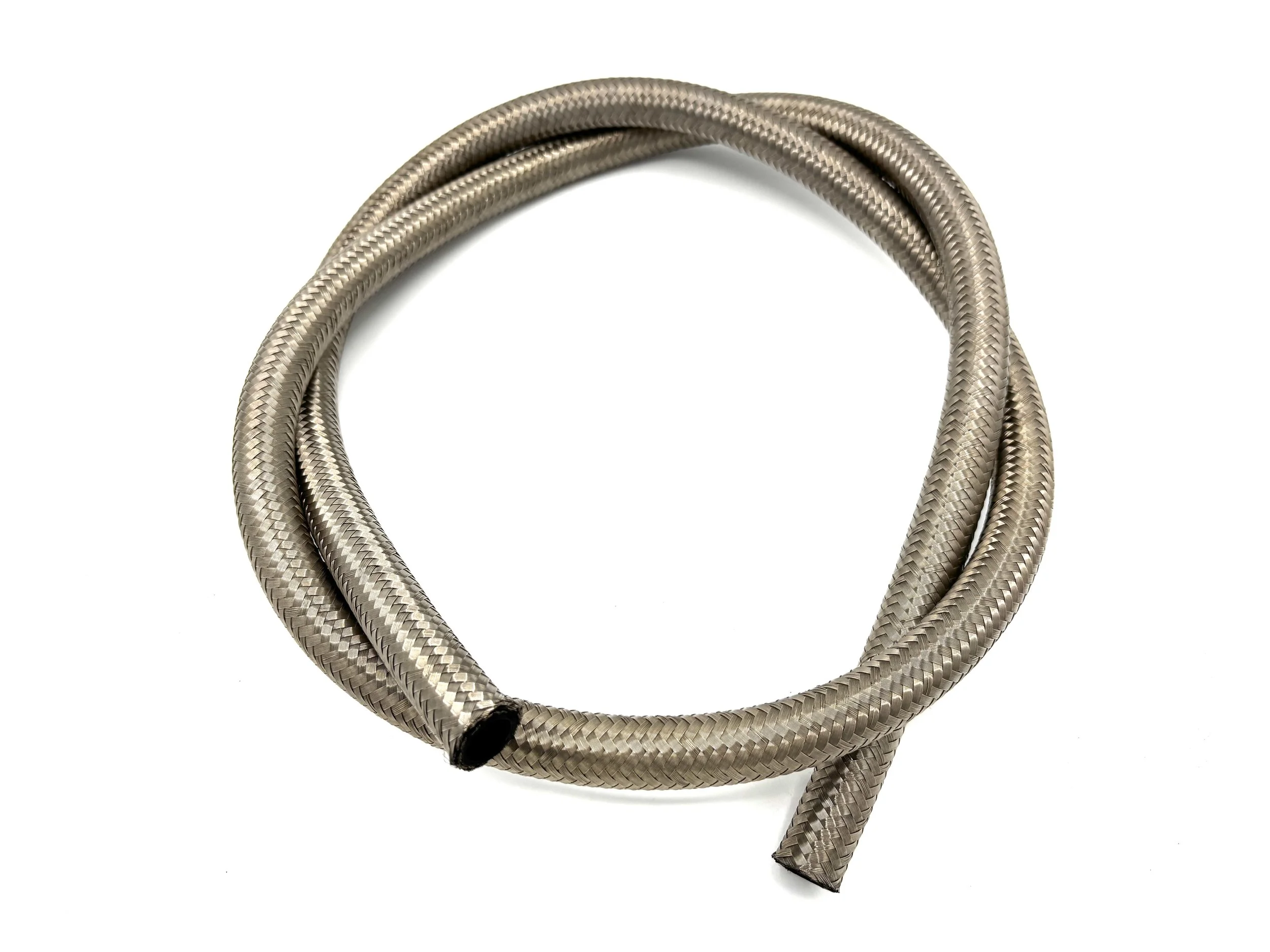 Stainless Steel Braided hose. Top view of hose coil. Silver