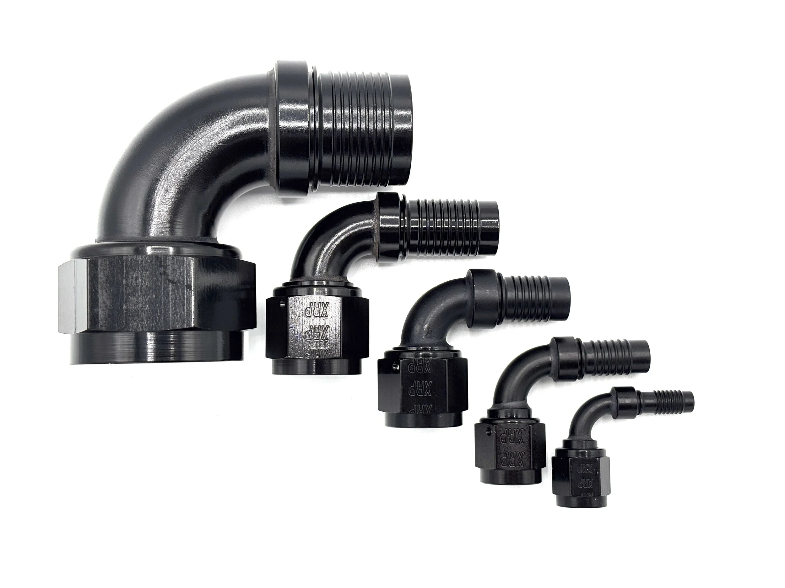 XRP 90 deg. HS-79 crimp hose end to AN female. Black in color. Various sizes from largest to smallest, left to right.