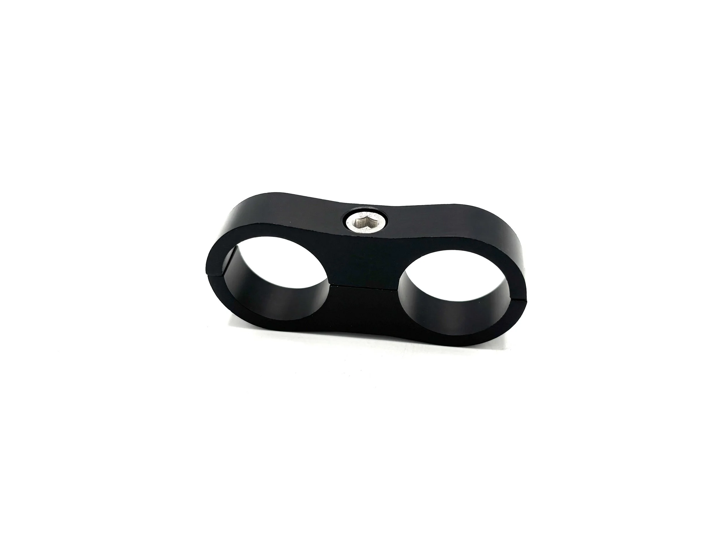 Setrab billet hose separator. Black in color. Has bolt on top.