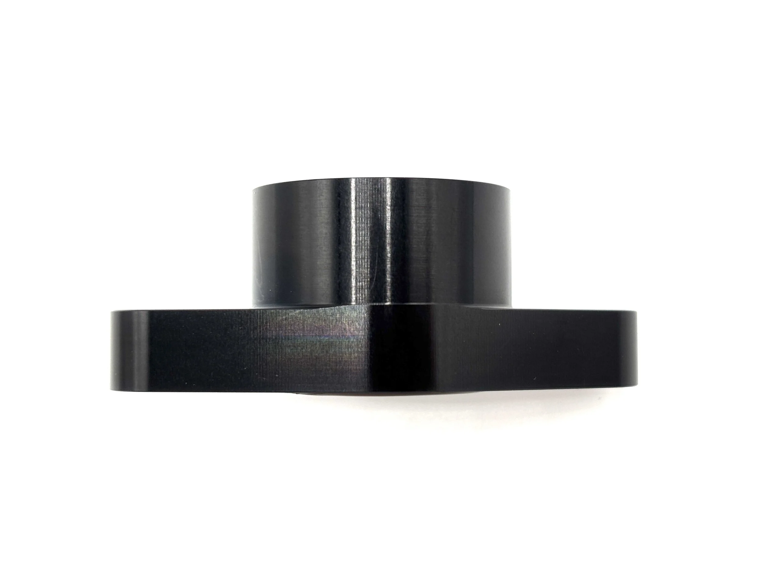 Earl's -12AN ORB female to turbo oil drain flange fitting. Black in color.