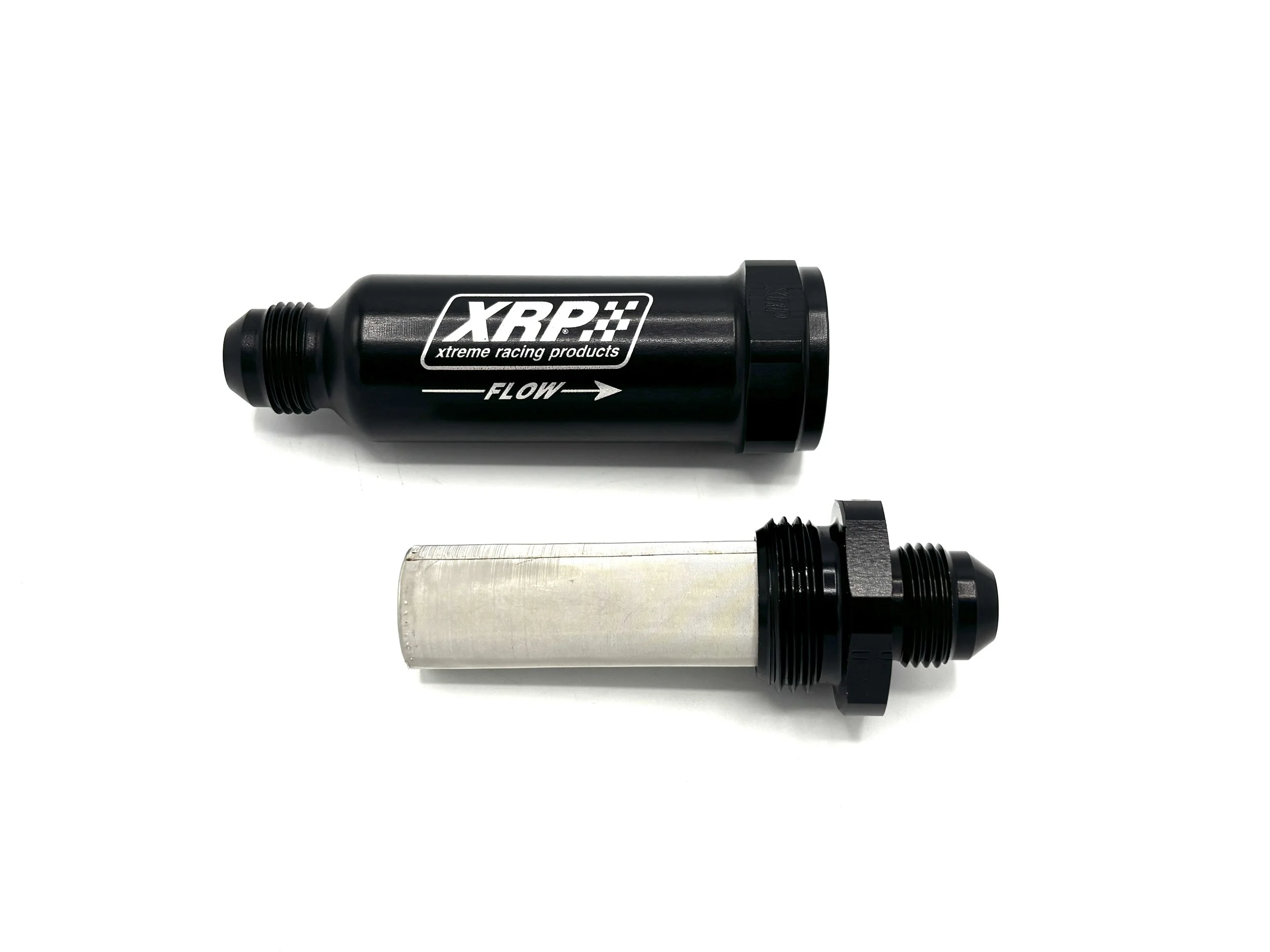 AN Fuel filter that says XRP, the exterior is black. The element is removed and is set next to the housing.