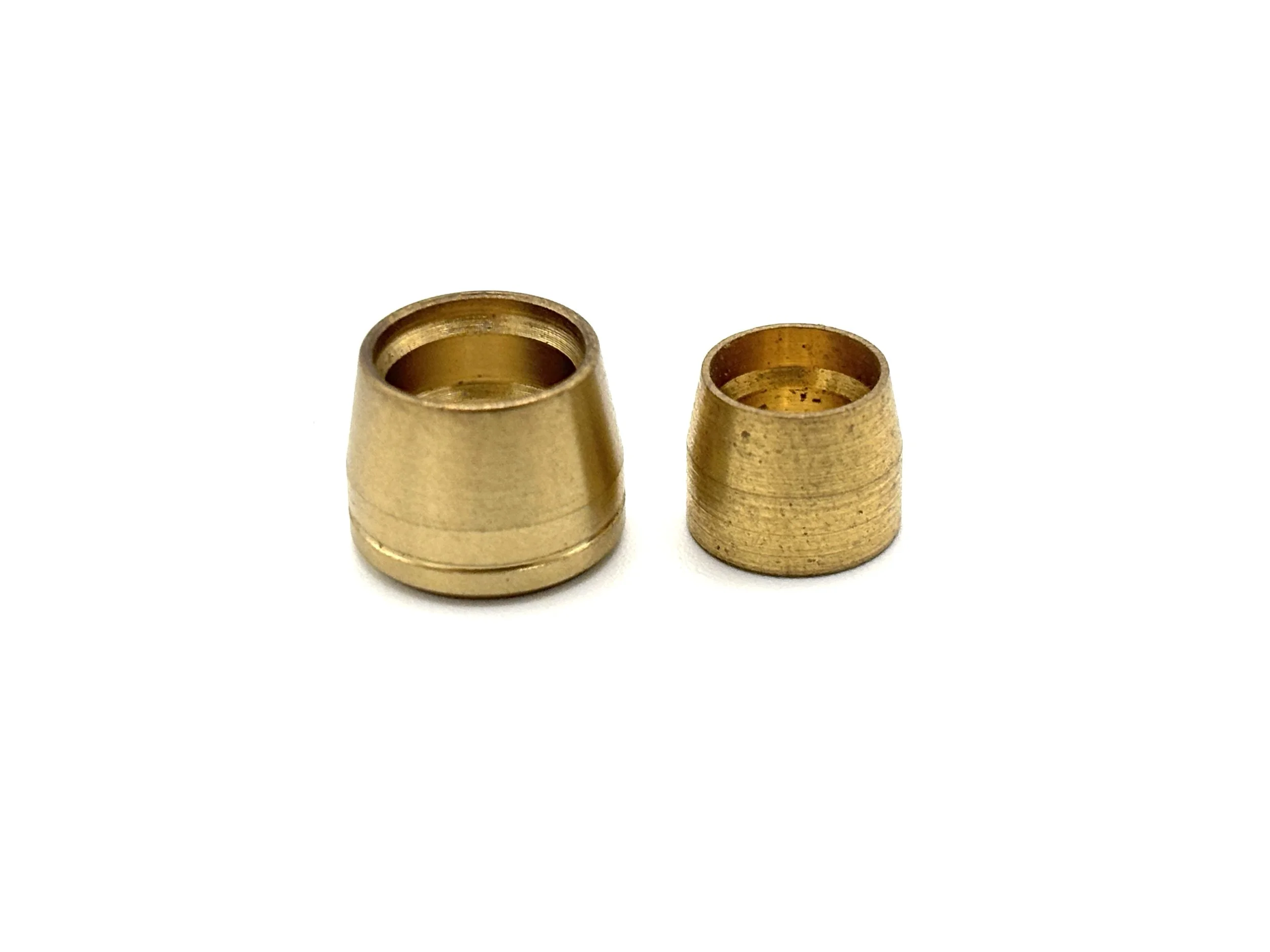 XRP replacement AN brass olives. Gold in color. Various sizes from largest to smallest, left to right.