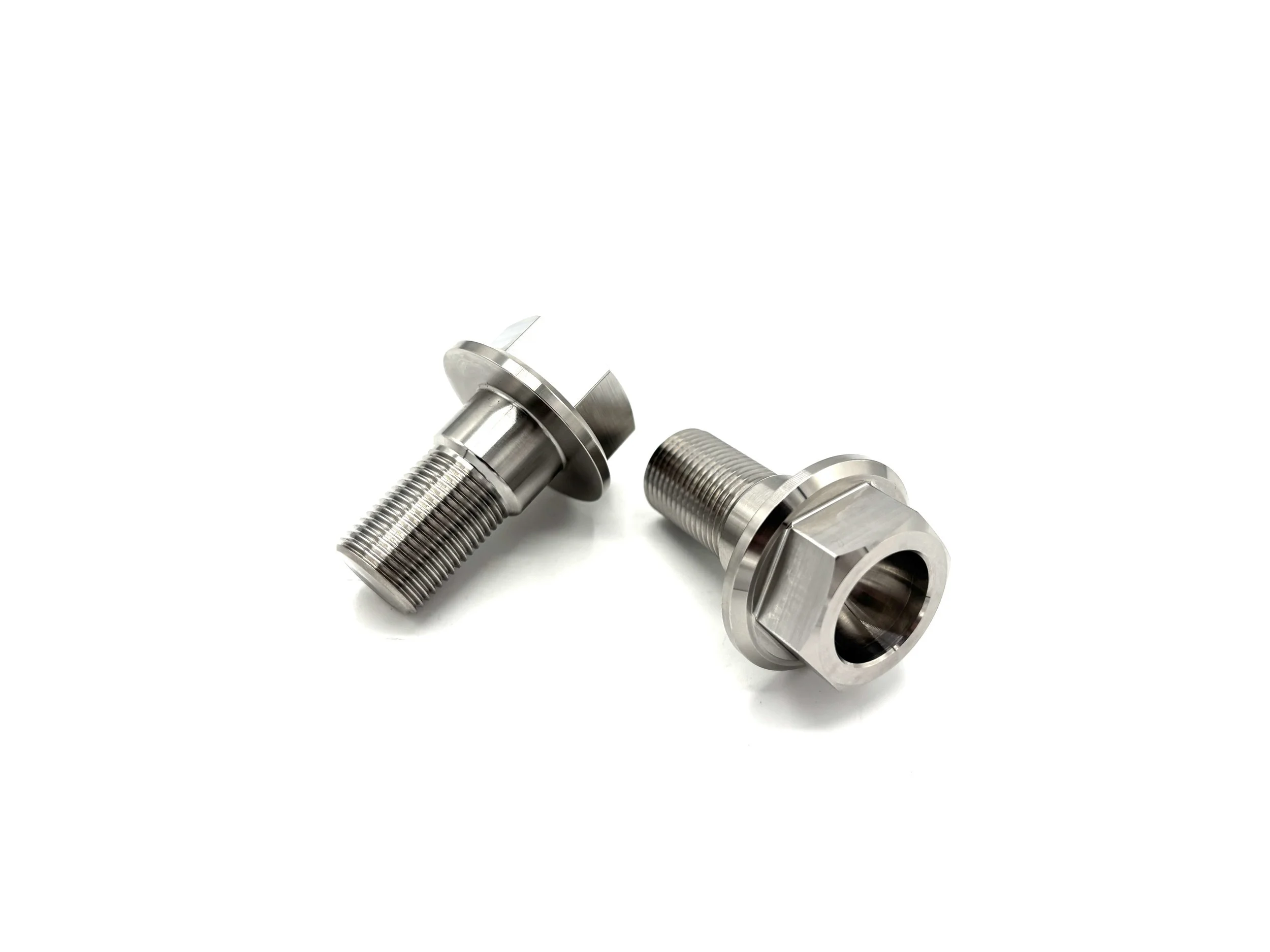 Two silver color VW transmission bolts. A dish is in the top of the bolt head.