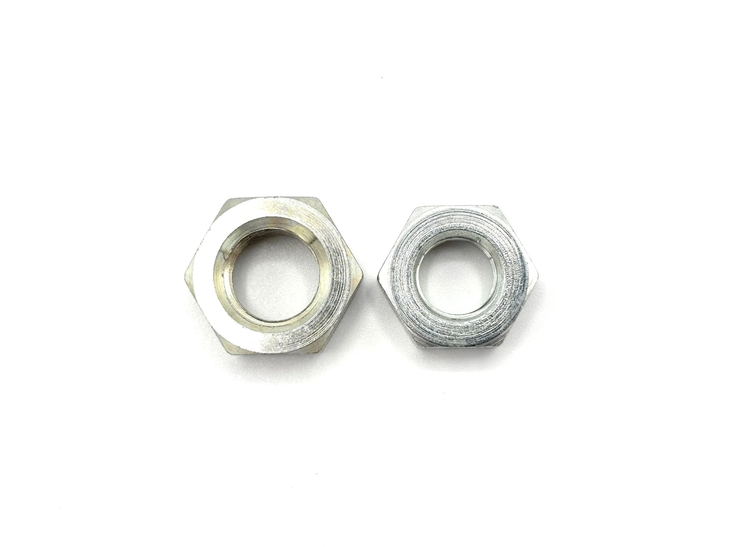 XRP steel bulkhead nut. Silver in color. Various sizes from largest to smallest, left to right.